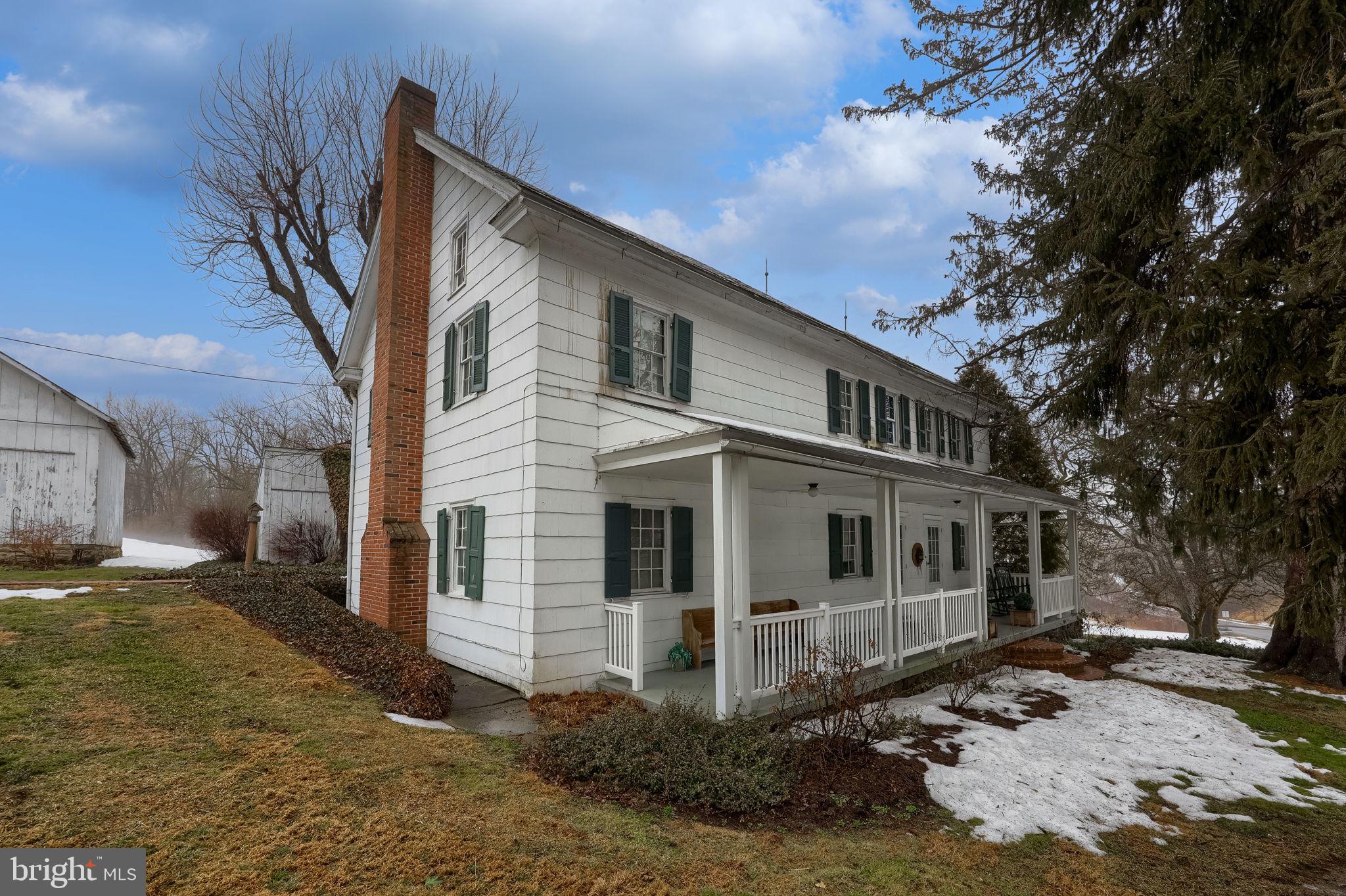73.31 +/- acre farm with (6) Bedroom, (2) Bath farmhouse with all the features and charm of yesteryear! Bank barn with finished recreational area / room with kitchen, equipment shed, silos, and lots of other outbuildings. Not in Ag preservation. Lots of possibilities. 53+/- acres are tillable!
