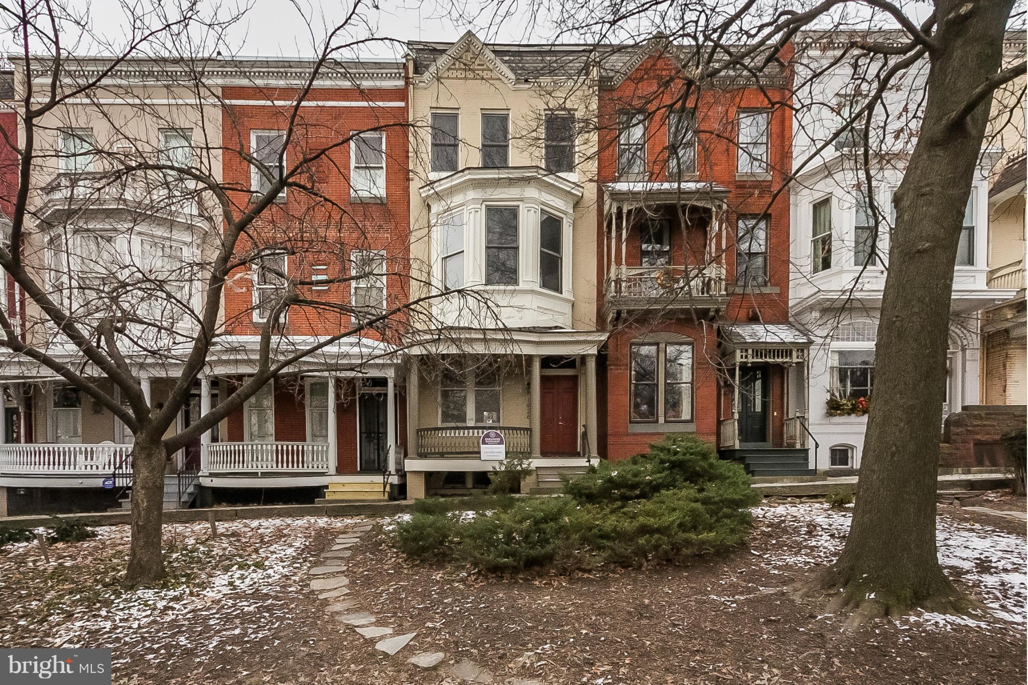 Rarely available renovated historic porch front 4 bdrm 2 1/2 bath home in Reservoir Hill.   Perfect blend of modern open floor plan & historic detail.  Finished walk-out basement - 2 zone HVAC - high ceilings - large enclosed yard w/possibility of parking pad.  lovely park view and closer to Penn Station/Marc than many Bolton Hill homes.  HMS warranty