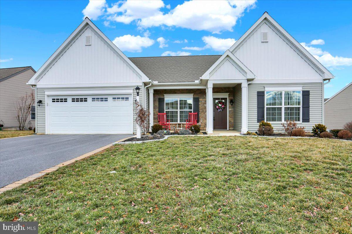 Stonecroft Village 55+ Community. Check out this 3-year-old move in ready home.  The home features 3 bedrooms and 2 full baths with an open floor plan. You can enjoy the beautiful front porch or sit on your back patio enjoying the sunsets. There is a 10 x 14 shed which is spacious and allows for plenty of storage. The community is very active with activities, walking trails and a clubhouse which has a gym, kitchen, library, pool table and a hearth room to entertain friends.