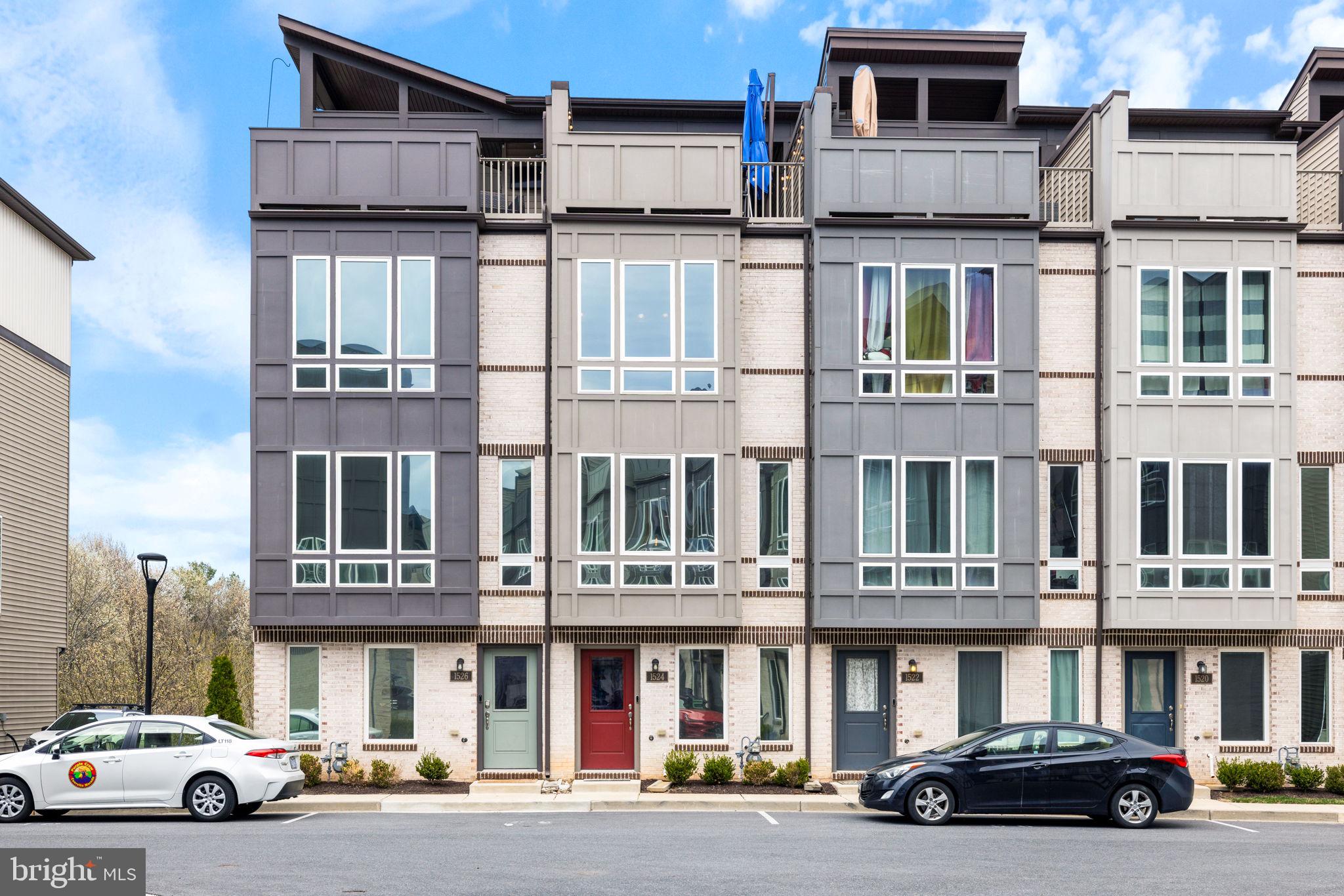 Modern Elegance Meets Outdoor Luxury – 1524 Trafalgar Lane.
Welcome to 1524 Trafalgar Lane, a contemporary 4-level townhome built in 2019, offering the perfect blend of modern finishes, functional design, and elevated outdoor living. Located in the desirable River Place community, this 3-bedroom, 2.5-bath home spans 1,660 square feet of thoughtfully crafted space.
Step inside to tall windows that flood every level with natural light, highlighting the sleek hardwood flooring and open-concept layout. The gourmet style kitchen boasts crisp white quartz countertops, a large island, and upgraded stainless steel Café gas range and refrigerator - delivering both style and practicality.
Enjoy relaxing or entertaining in the spacious living room, complete with an electric fireplace feature and serene wooded views off the back of the home. The primary suite offers a spa-inspired retreat with dual vanity, soaking tub, and a walk-in shower.
But the crown jewel is the expansive rooftop terrace—designed for unforgettable gatherings. It features a gas fire feature, cozy lounge seating, a full dining setup, outdoor flat-screen TV, stainless steel mini bar, oversized patio umbrella, and string lighting that sets the mood for every occasion.
Additional highlights include a one-car garage, an assigned parking space, and a prime location just minutes from downtown Frederick and major commuter routes.
Don't miss the opportunity to call this unique and stylish home yours.