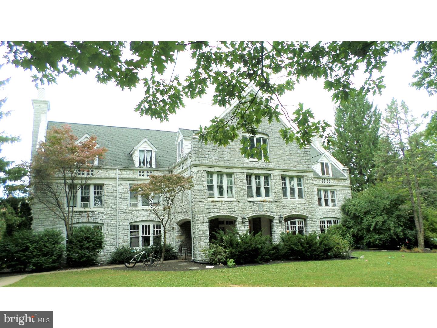 Fraternity Student Housing. Fraternity Row at Pennsylvania State University State College Main Campus location. Within three blocks to Pennsylvania State University main campus and downtown State College. Beautiful stone manor home fraternity house over 11,000 square foot above grade square footage and an additional 6000 square foot below grade square footage. Economical natural gas heating system, all mechanical systems up and operational, fully maintained and under contracted maintenance program. Large on-site parking lot with road frontage on three sides, room to possibly expand. All on 0.84 acre m/l level lot with expansive green lawns, mature trees and shrubs and walkways. Own this recession resistant student housing in HAPPY VALLEY. Seldom available University Park/State College property. Proof of funding will be required. Funded principles only please. Recent commercial appraisal supports pricing on this great student housing property. Quarried true stone home with hardwood flooring, coif erred ceiling, two stone fireplaces flanking the formal entry hall. Covered pillared front entryway with quarry tile leads you into the center hall foyer. All bathrooms and showers have been recently remodeled and are fully functional. Expansive commercial grade kitchen with appliances and fixtures are fully operational. On site laundry facilities and equipment provide additional income stream for the new owners. All rooms are individually secured and in very good condition. Newer windows and doors throughout property. Professionally installed sprinkler system and security system with remote monitored camera system provide peace of mind and security. Extensive level mature grounds and trees with walkways and on site parking.