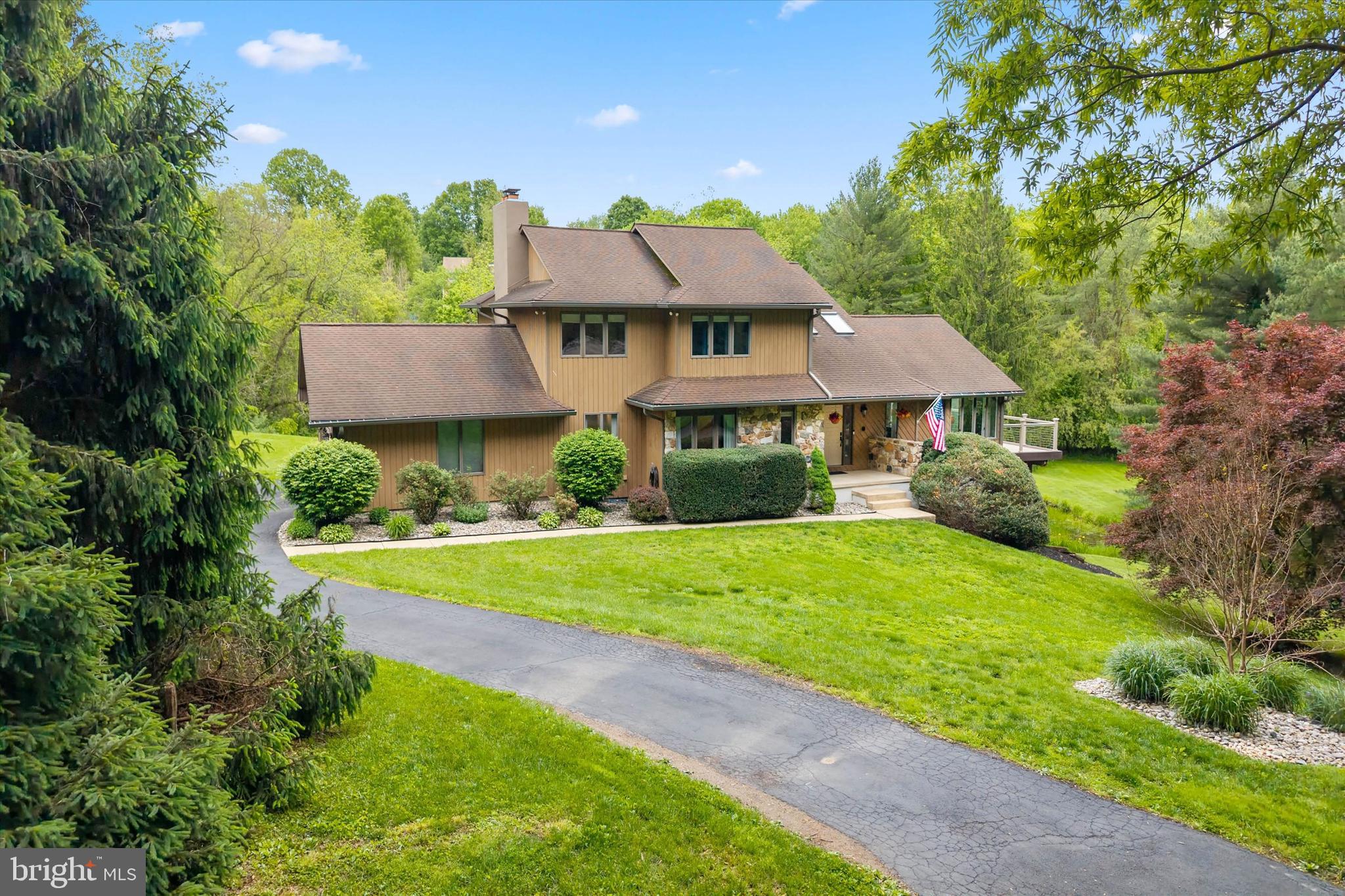 Welcome to 43 Bridleshire Rd., located in the highly desirable North Star area and nestled within the prestigious community of Bridleshire Farms. This magnificent custom-built home offers the perfect blend of luxury, comfort, and tranquility, all set against the backdrop of your own private pond and breathtaking natural views.
Designed with an open and airy floor plan, this exceptional home showcases soaring cathedral ceilings, oversized windows, and skylights that fill the interior with abundant natural light. The beautifully updated kitchen is the centerpiece of the home, featuring gleaming granite countertops, a fantastic center island, and stainless steel appliances — ideal for both everyday living and entertaining. Extensive updates throughout include the kitchen, the luxurious primary bathroom, and much of the flooring, creating a truly move-in-ready experience. Warm and inviting living spaces are highlighted by two wood-burning fireplaces — one located in the spacious family room and another in the serene primary bedroom retreat.
The upper level features three generously sized bedrooms, a full hall bath, and the stunning primary suite with its beautifully updated en-suite bathroom. The main level  not only includes most of the living space but an additional bedroom perfect for guests, an in-law suite, or a private home office, along with a full bath and convenient half bath.
The lower level adds approximately 1,000 square feet of finished living space and includes a luxury pool table area, providing endless possibilities for recreation and entertaining.
Step outside onto the maintenance-free wraparound deck and enjoy panoramic 180-degree views overlooking your own peaceful pond — a truly tranquil setting rarely found. Combining privacy, elegance, and an unbeatable location in one of the area’s most phenomenal neighborhoods, this extraordinary property is a rare opportunity to own a one-of-a-kind home in Bridleshire Farms.  NEW HVAC 2023 & New ROOF 2026!