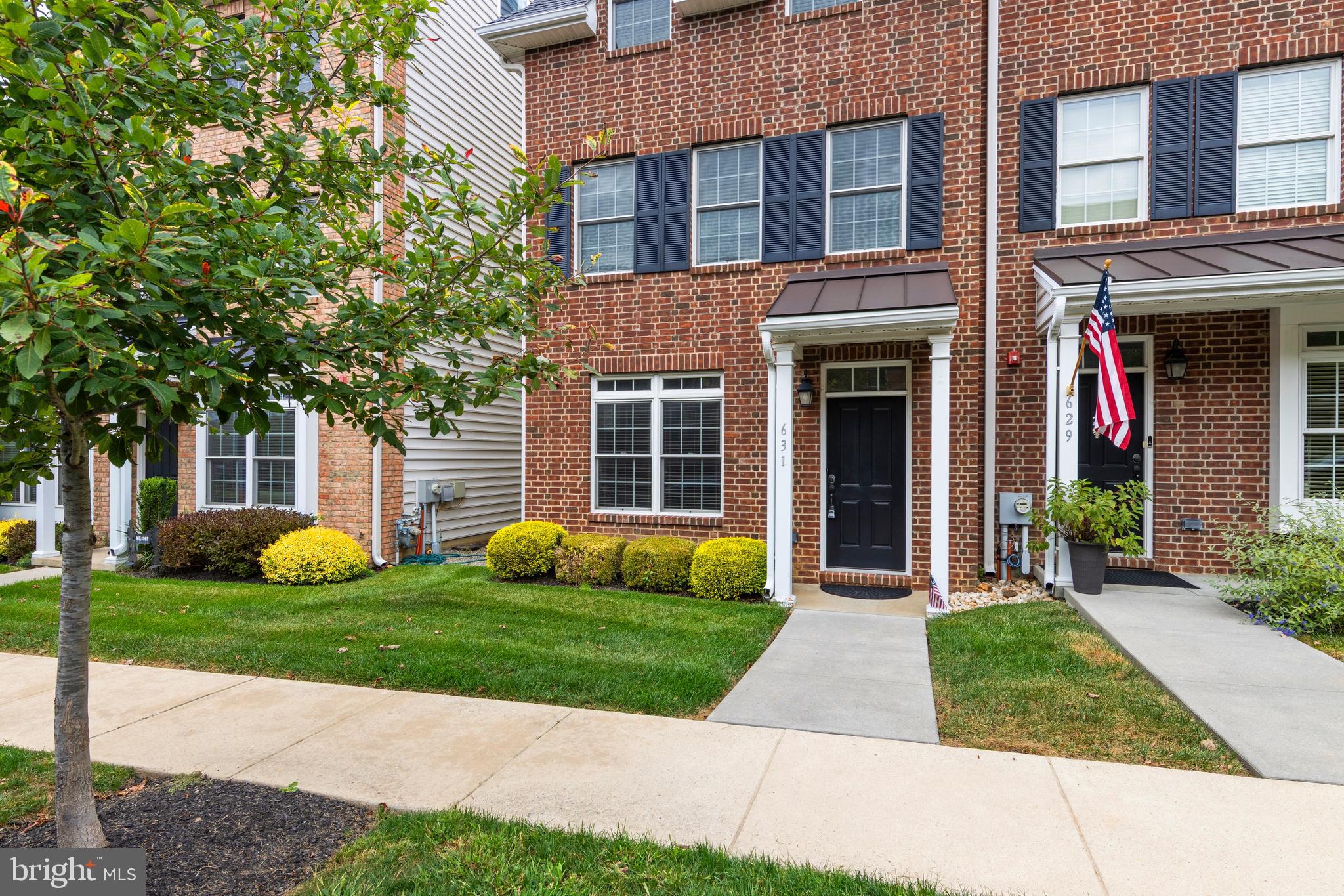 Fantastic opportunity in Magnolia Place for this pristine 3 Bedroom, 3.5 Bath townhome situated on the quiet street of Magnolia Ct.  This gorgeous home offers the best of both worlds with street parking out front and private parking (Garage and exterior) out back!  Open floor plan on the main level is accentuated by gleaming floors and a custom gourmet kitchen with stainless appliances and access to the private rear yard!  Upstairs, the spacious main bedroom features a walk-in closet, tray ceiling and private full bath.  Guest bedroom is en-suite with it's own full bath as well.  Laundry is also conveniently located on this level.  Fully finished 3rd level is fantastic and can serve as a 3rd bedroom complete with a Full Bath and access to the terrace with stunning views of this amazing Borough location.  A short walk to downtown Kennett Borough's shops, restaurants and attractions and award-winning KCSD schools make this stunning home a must-see!