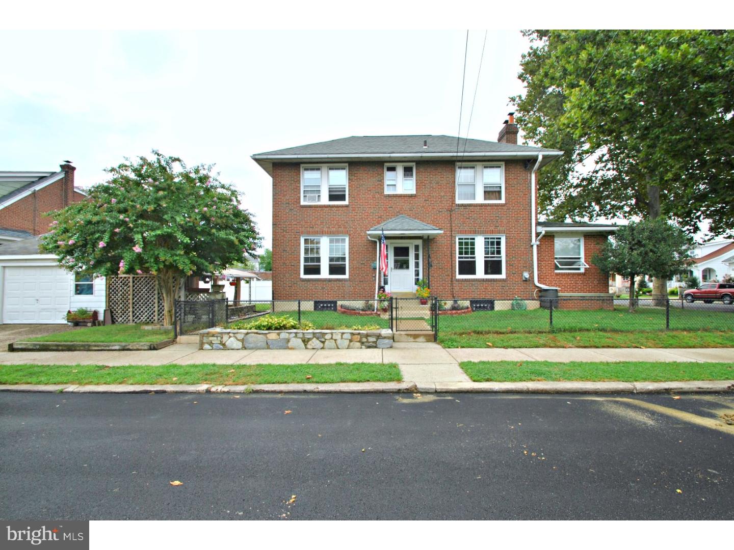 Welcome Home!  This center hall colonial single in Burholme/Fox Chase on a double lot is just what you have been searching for. The first floor has a great layout, updated eat in kitchen large dining room with hardwood floors, powder room off to the side, living room with working stone wood burner fireplace and entrance into sun porch/Family room full of natural light.  The center stairs lead to the second floor, with 3 large bedrooms, great closet space and an updated 3 piece bathroom.  The master bedroom has his/her closets with a window seat in between.  The basement is clean and houses all mechanicals and has plenty of storage.  The yard and outside space is great!  Covered porch at the front entrance, side covered patio off the rear kitchen door and rear and side yards larger than most in the area.  There is also a 1.5 car garage that fronts on Claridge street.   Make your appointment today!  This home wont last long in todays market.  One of a kind in the neighborhood!!