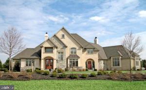 5 bedroom home in Manheim Township's Stonehenge on 1.87 acres.  Eat in kitchen with island, desk, walk in pantry & wet bar. Family rm with wall of windows, gas fp & cathedral ceilings and 2nd gas fp in living rm with build in cabinets. 1st flr master suite with whirlpool tub in master bath & 2 story ceilings.  Finished daylight lower level with media room, in-law suite & exercise rm. Screened in porch, rear patio & mature landscaping.