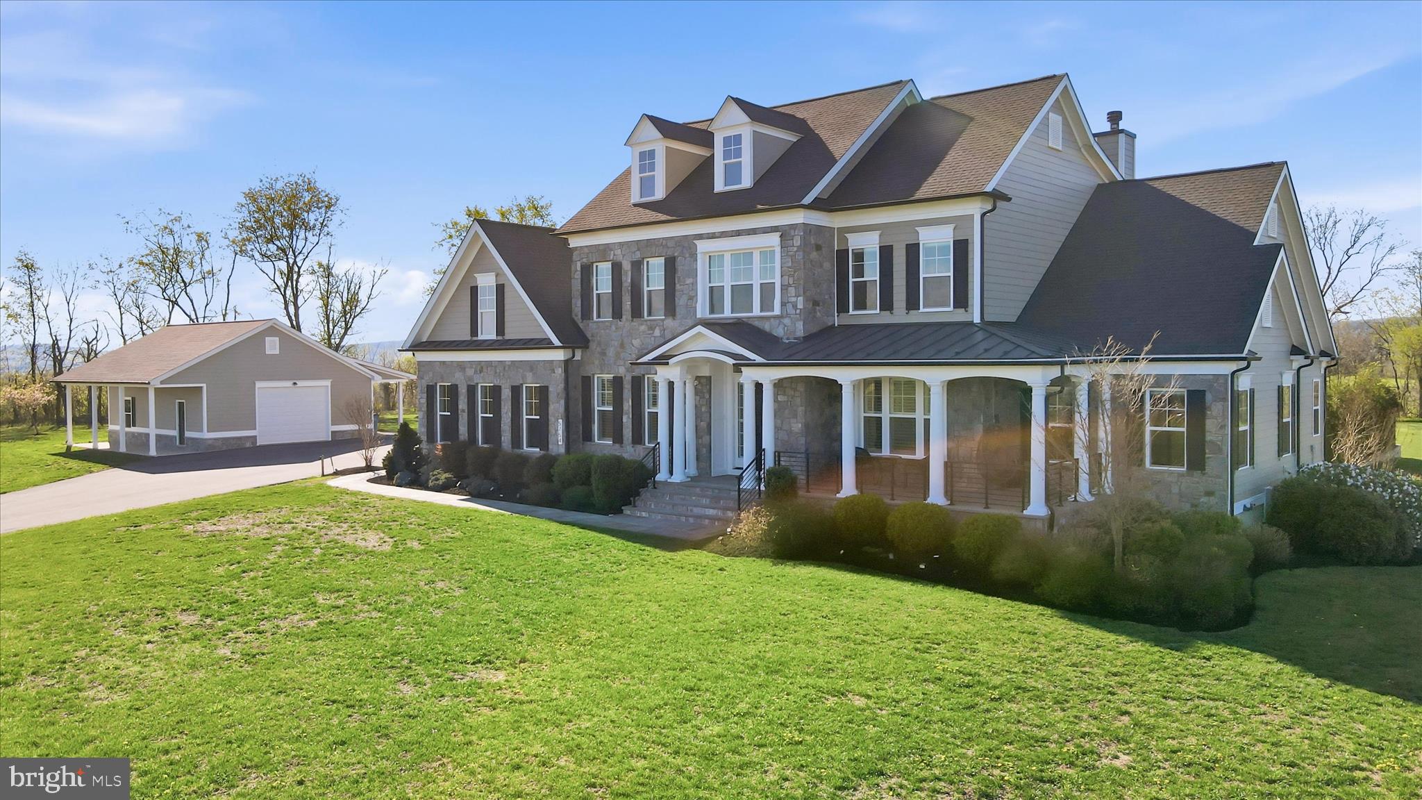 This meticulously maintained six year young, Mitchell & Best custom built home offers high-end living with casual comfort. Situated on 7.6 acres and surrounded by pastures with views of Sugarloaf Mountain, it provides a tranquil setting for privacy and social gatherings.
 Upgrades and amenities abound. Gourmet kitchen complete with a Viking range/oven, additional wall ovens, two walk in pantries and breakfast nook. In addition the home offers coffered ceilings, stone fireplaces, plantation shutters, built-ins and an abundance of storage. The first floor primary suite has a steam shower, dual vanities and closets. The laundry area includes additional millwork, wash sink and one of three refrigerators. The upper level media room compliments the bedrooms and bathrooms on that level, offering an additional gathering area (game room, homework area, office, gym etc..)The substantial lower level is unfinished but has oversized French doors for easy outside access.
 There is an enclosed sunroom with fireplace and television that overlooks the pool and patio providing additional interior space and a serene space to begin each day. Stepping into the rear patio and entertaining area you will find a heated pool with spill over spa and a pavilion with built in grill and granite countertops. The tree lined backyard is expansive and private.
 Two separate attached garages accommodating five cars, (one of which is heated with a work bench and 12 ft. ceiling to support a possible lift for the car enthusiast) and a separate outbuilding provides parking and storage.
 This home is beautifully constructed utilizing real blue stone and James Hardie cement siding. Additional items to note include: whole house generator, house surge protector, water softener, ultraviolet light for water treatment, invisible fence and pet wash.
 Conveniently located to Frederick, Urbana, Montgomery County, Leesburg, MARC train and the C & O Canal. Major airports within an hour's drive.
 A great property priced below appraisal which is available upon request.
Schedule a showing today!!