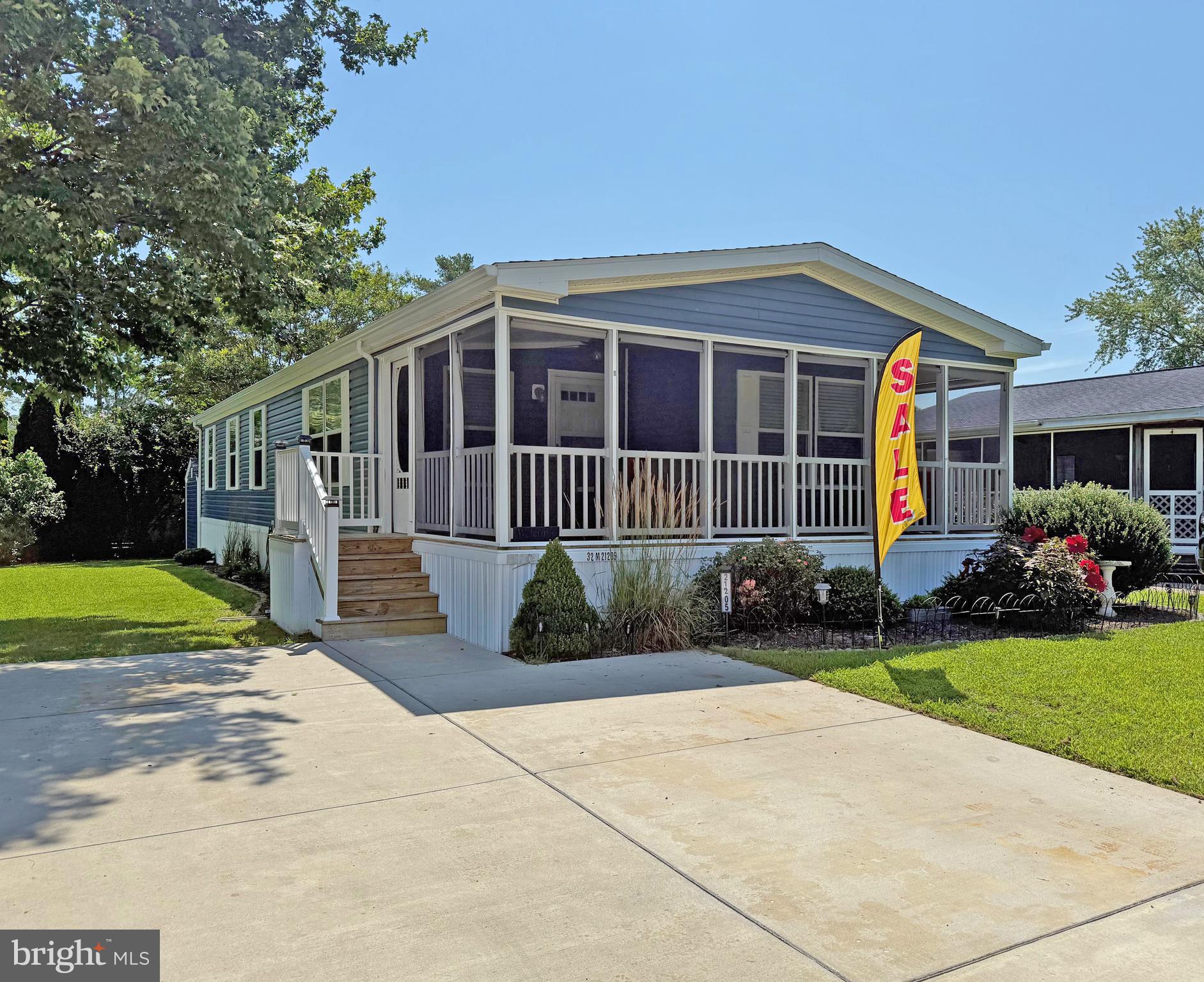 Rehoboth Bay Community has boat slips for rent, a community boat ramp, a boat storage area, a Bay-front pool, a crabbing/fishing pier, a little beach, tennis/pickleball courts & more!  And it is just 6.5 miles to the famous Rehoboth boardwalk. This like-new 2019 Commadore is ready for your enjoyment! Freshly painted.  The open floor plan has vaulted ceilings and luxury vinyl plank flooring throughout. The living room has built in shelving, which is perfect for an entertainment center. The kitchen has a breakfast-bar island and a stainless steel appliance package. There’s a fridge with ice maker, dishwasher, a gas range, and a built-in microwave. The kitchen also features soft-close drawers and a stainless steel farm sink. The dining area adjoins the kitchen. The hallway leads you back to the main bedroom. It is en Suite with the bath having a large step-in shower with a seat, a linen closet, and a walk-in clothes closet. The other two bedroom share the second full bath in the hall, which has a tub/shower. There is second linen closet next to the hall bath and a hall coat closet. The laundry room has a stack washer and dryer and storage cabinets. You are going to love the L-shaped screened porch! Pretty gardens surround the home. There is a storage shed for your gardening, boating, fishing & beach gear. Central AC and gas (LP) furnace. The patio area next to shed is a great place for your barbeque grill. Golf carts are allowed in Rehoboth Bay. The community also allows 2 pets (no fences, though).  Leasehold Interest: Lot Rent of approx. $959/mt. includes water service & trash/recycle. (Delaware law caps rent increases as per 25 Del. C. Sec 7050-7054 with Lease renewals on Jan. 1). Homeowner pays electric, sewer, cable/Internet, and lawn maintenance.  Hometown America, the community owner, requires an Application from the Buyer (and all adult occupants 18-year-of-age or older), with acceptance based on the following criteria: 1.)income verification, 2.)credit bureau score, plus evaluation of debt-to-income ratio, and 3.)criminal background check. No short-term or weekly rentals, but rentals of 6 months or longer are now allowed with approval of the Community Owner.  Financing may be available to qualified borrowers from only a few Lenders that specialize in installment/chattel loans for manufactured homes on leased land. Closing costs will include a real estate transfer tax (3.75% DMV Doc Fee) & a Settlement Agent fee.