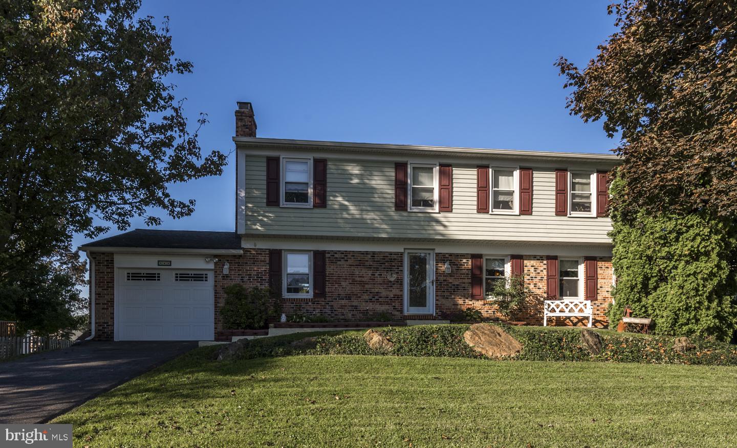 This UPGRADED Manheim Township home has much to offer! Featuring 4 bedrooms, 2.5 baths (granite countertops in all baths, new faucets, vanities, toilets), renovated kitchen with granite counter tops, with 6 foot long granite island/breakfast bar, maple cabinets and stainless steel appliances. Cherry laminate flooring on first floor, formal living room, dining room, family room with wood burning fireplace.  All new double pane insulated vinyl tiltin windows, new gutters/spouts with gutter helmet, new garage door/opener. Laundry on first floor, fully finished basement with carpet and a regulation size pool table for the entertainer in you! Also a 37 foot long porch which includes a screened in portion for dining, tray ceilings, and outdoor ceiling fans for your comfort - outdoor entertaining and relaxation! Newer heater/AC and hot water heater. Call today for your private showing!
