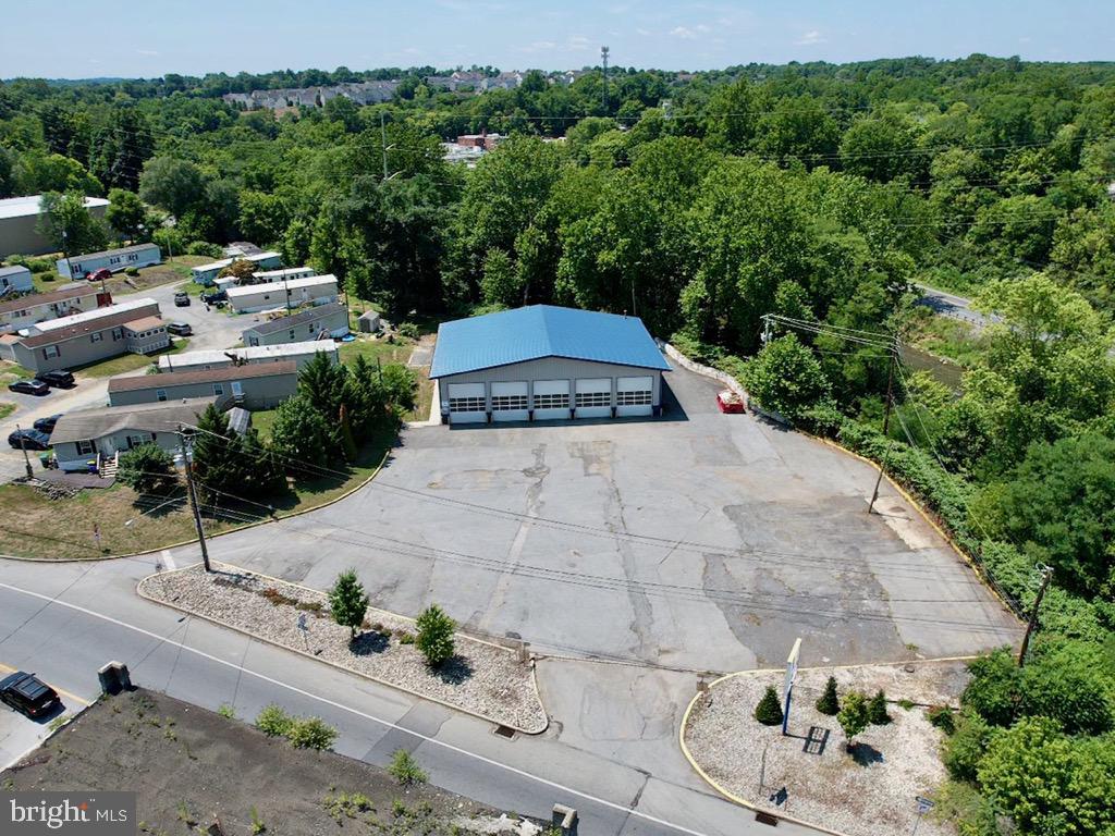Bring your vision to this nearly new building, ideally located on the outskirts of thriving Lancaster City. A short drive from the major routes to Philly, Harrisburg and the surrounding areas, this will provide an excellent location for its new owners. Industrial/Mixed Use zoning allows for a wide range of uses including many types of manufacturing, trucking, excavation, contractors and much more-see the detailed list in the attachments. 
 Recreational uses such as breweries, restaurants, gyms, gun ranges & many others are also permitted and could be greatly complemented by the adjacent Conestoga River, which could make for a beautiful, incredibly unique setting for the person with vision.
With 5, 14' x 16' garage doors and 50'+ deep bays plus office and storage space, and an abundance of parking on the 2.9 acre lot there's lots of room for a small business to grow here. The building is insulated, with heat in place and AC in the offices, a high quality build that lends itself to a wide range of uses. The location offers excellent exposure on a main route exiting the city, presenting a significant opportunity for businesses that would benefit from increased visibility. The property is easy to tour, take this exceptional opportunity while it's available!