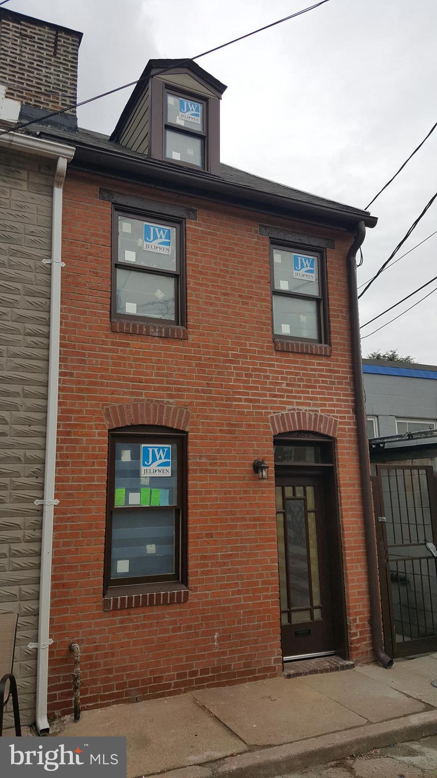 Circa 1835 Historic Federal Fells Point townhome, newly and completely renovated.  It conveys with a 10 year CHAP tax credit.  This townhouse is larger than the typical Fells Point alley street houses. Located on an unusual urban cul de sac, it is semi-detached and features a side courtyard,  new flooring, new white wood cabinetry, a deck and a lovely new bathroom. CHAP CREDIT IS APPROVED.