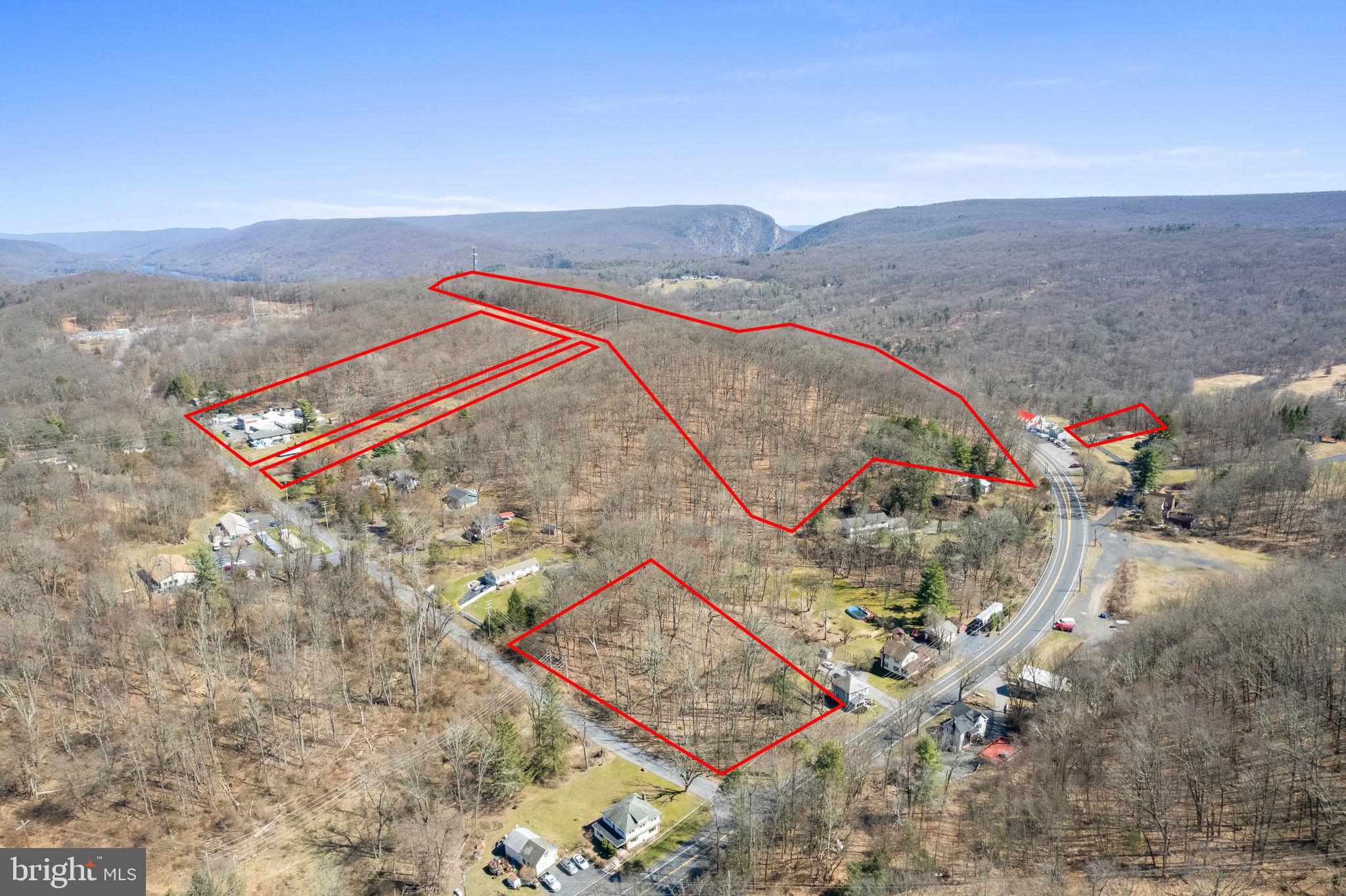 Opportunity is knocking with this package deal.  A 38 unit motel on a large piece of land plus 3 other lots in the immediate area for sale.  Plenty of development possibilities especially being 5 to 10 minutes drive from Stroudsburg and E. Stroudburg University.  Campground, Tiny houses, Resort, Apartment complex, Housing development, Biking and Hiking trails.  Bring your imagination for this one! A total of 1,053,596 sqft of possible development.