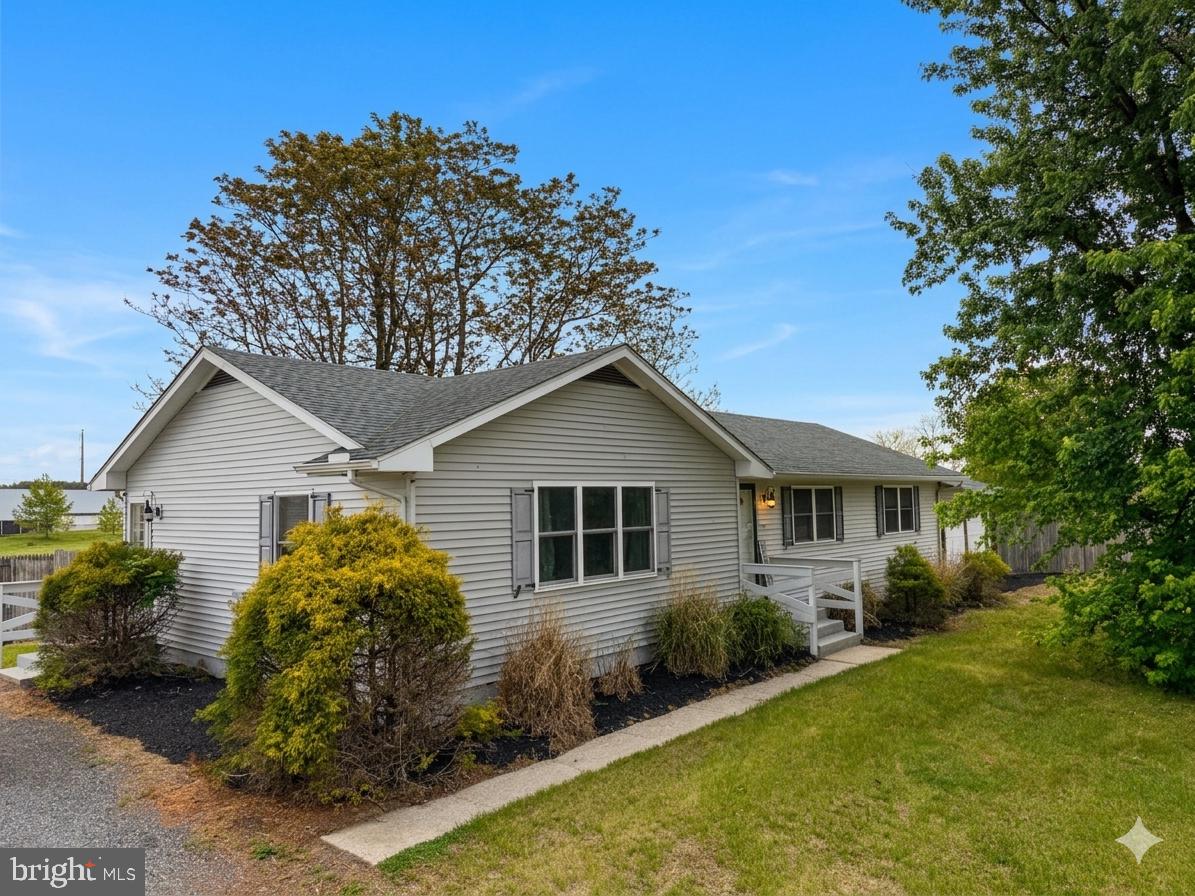 Completely renovated in 2017, this beautiful home sits on a spacious one-acre lot offering room to spread out and endless possibilities both inside and out. Step inside to a welcoming foyer where gleaming hardwood floors flow throughout the generous living and dining areas. The main level features elegant crown molding and chair railing, along with a stunning open-concept kitchen complete with a large island and stainless steel appliances — perfect for entertaining or everyday living.
The main floor also offers three bedrooms and two full bathrooms, including a spacious owner’s suite with sliding glass doors leading directly to the exterior patio. Downstairs, the expansive lower level provides incredible flexibility with space for a future recreation room, home gym, office, guest area, or more, plus a rough-in for a third bathroom already in place. A rare combination of updated finishes, functional space, and acreage makes this property a must-see.