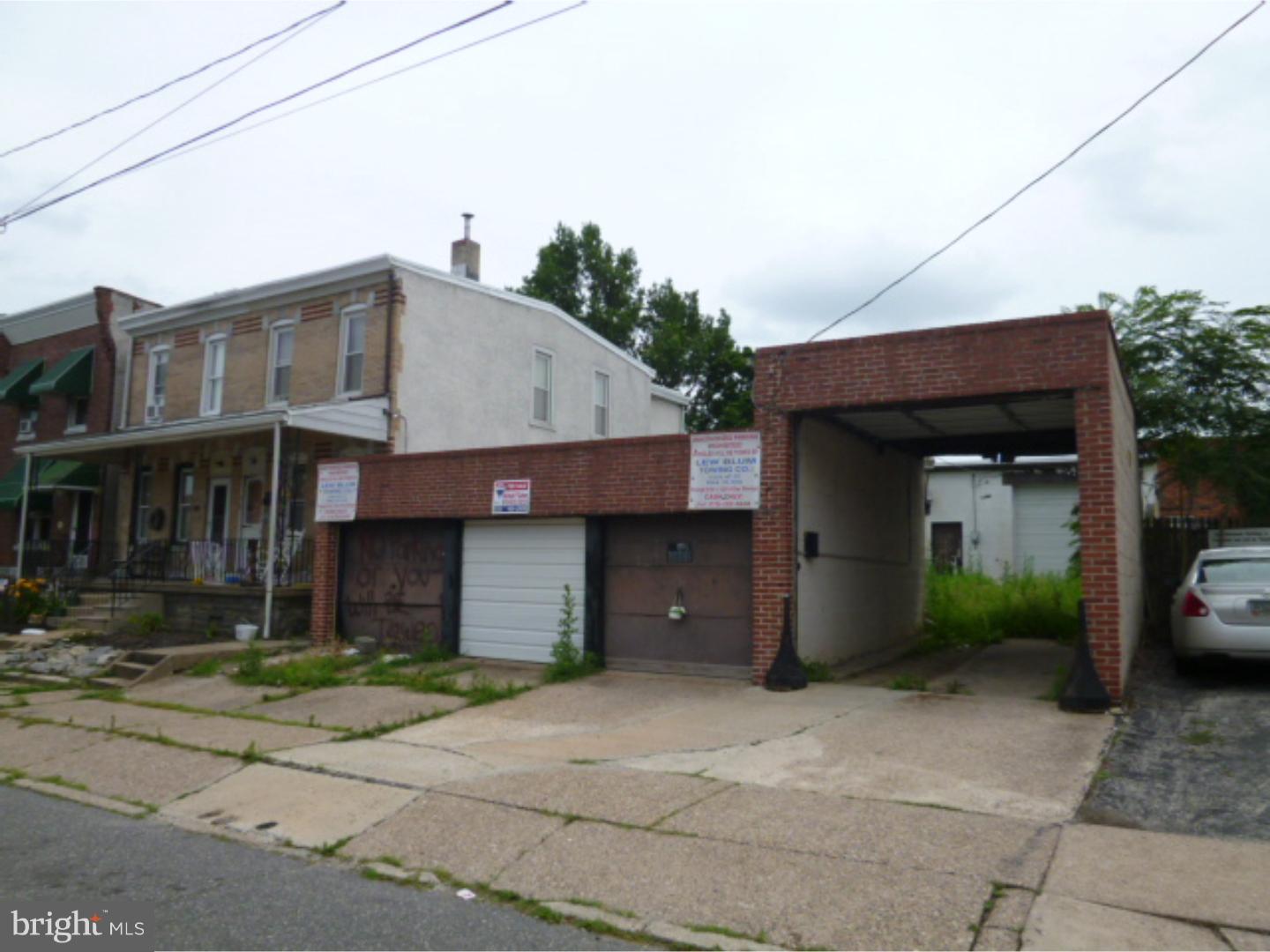 BACK ON MARKEtFRONT BUILDING: 3-Single Garages approx. .8' wide each  with curb cut REAR BUILDING: 2-Large garages (1. 15'9" wide / 2. 20' wide) COURT YARD: (app.33'5" X 35'9") modify stone surface  Property has 200 amp service and has many possible uses for a contractor, car buff, garage rentals, contractor warehouse, car detailing. All offers will be presented, property is ez to show and see.  $5000 deposit is required Owner will consider short term financing