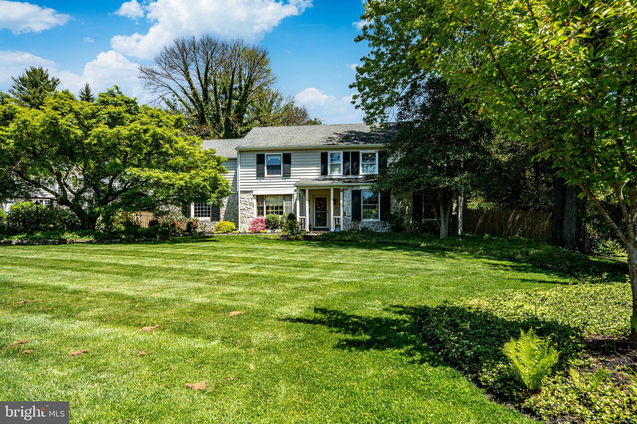 Villanova’s 1607 Lark Lane is a classic Main Line Colonial tucked into one of the area’s most desirable residential enclaves, Rolling Meadow Estates.  Set on nearly 0.7 acres along a quiet, tree-lined cul-de-sac, the home combines timeless architecture with the privacy and prestige that define North Side Villanova living.  Originally built in 1959, the residence offers approximately 3,630 square feet with four bedrooms, three-and-a-half bathrooms, 2 fireplaces, and a traditional two-story layout designed for both elegant entertaining and comfortable family living.  An attached garage, expansive and private yard with an in-ground pool create a setting that feels refined and relaxed.