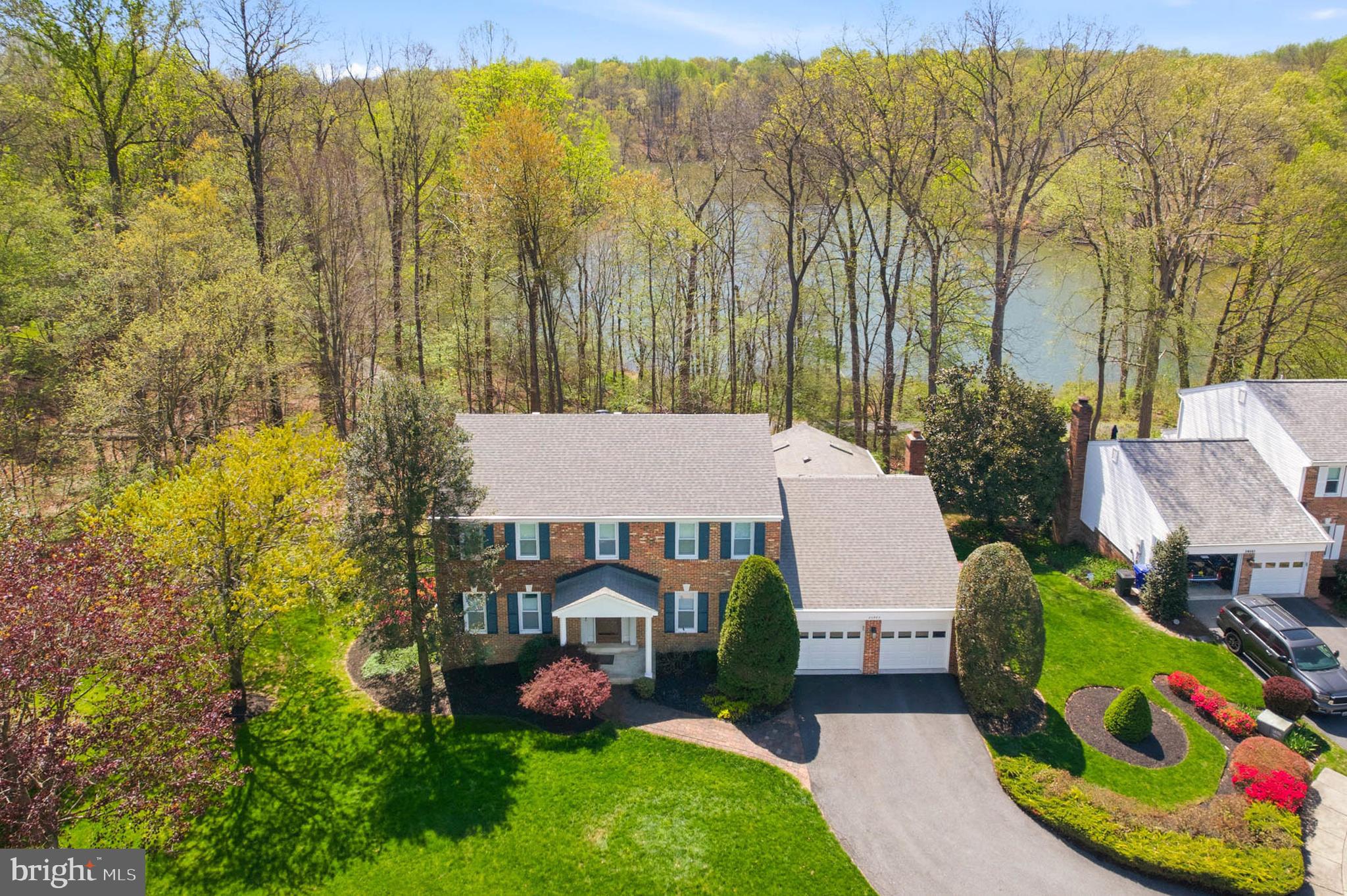 OPEN HOUSE SUNDAY SUNDAY JULY 26th (1-3pm)...Opportunities like this one rarely hit the market! Truly one of the best natural settings in the county! Immerse yourself in nature in this stunning colonial home backing to Little Seneca Lake and Black Hill Regional Park! While the setting might be immaculate, the interior of this home is equally as impressive! A spacious main level floor plan includes a welcoming foyer, updated powder room, a separate dining room, a formal living room, a private office with built-ins, and a recently remodeled gourmet kitchen that opens to a relaxing family room with fireplace! The upper level holds three sizable guest bedrooms, a hall bathroom, and a large primary bedroom complete with walk in closet and a luxurious en-suite bathroom! A finished, walk-out lower level holds a massive recreation room, a fifth bedroom, a beautifully remodeled full bathroom, and finished storage room! Enjoy quiet summer evenings relaxing on a screened in porch and deck that both enjoy stunning lake views! Recent updates in this pristine home include kitchen (2019), primary bathroom (2019), basement bathroom (2024), roof/gutters/siding (2024), rear windows (2019), solar panels (2024), electric panel (2023), updated carpet on upper/lower levels (2021), garage doors (2019), and more! Naturalists will truly be at home in this property with the option to hike trails, kayak on the water, or simply birdwatch from the perch of the porch but close proximity to local shopping, a variety of restaurants, and close proximity to major commuter routes make this location impeccable! If you are looking for a lake view paired with a spectacular property this might be your one opportunity for many years! Come quickly!