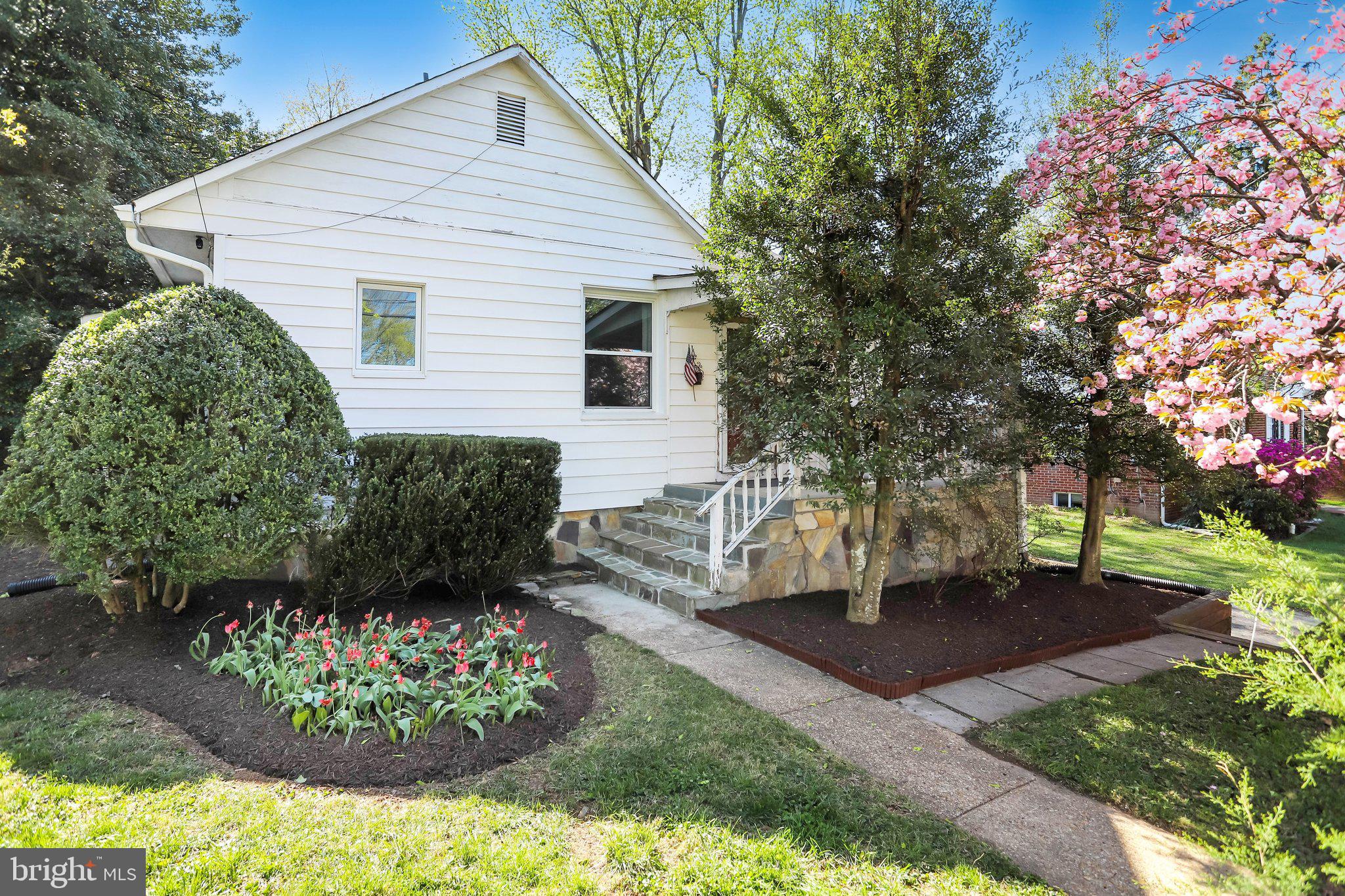 Welcome to this charming and beautifully updated 3-bedroom, 2-bath home offering approximately 1,500 square feet of stylish finished living space in one of Gaithersburg’s most convenient locations. Just moments from Olde Town Gaithersburg, the MARC Train Station, shops, restaurants, and major commuter routes, this home perfectly blends modern sophistication with timeless character. A welcoming front porch sets the tone, leading into a spacious living room filled with warmth and personality. Rich wood flooring flows through much of the main level, while custom paint and eye-catching shiplap accents create a fresh, designer-inspired feel. The updated kitchen is sure to impress with upgraded cabinetry, stainless steel appliances, abundant counter space, and an inviting layout that makes cooking and entertaining a pleasure. Two generously sized bedrooms, a beautifully renovated full bath, and a conveniently located laundry room complete the main level. <br><br>

The lower level is dedicated to an exceptional primary suite retreat that feels both private and luxurious. The expansive bedroom features a sliding glass door that fills the space with natural light and provides direct outdoor access. A comfortable sitting area creates the perfect spot to unwind, read, or enjoy your favorite shows. Thoughtfully crafted custom details elevate the space, including a stunning stone accent wall, shiplap feature wall, custom cabinetry, and a beautiful wood door leading to the updated primary bath. Every element has been carefully selected to create a one-of-a-kind living experience. <br><br>

Step outside to discover an incredible backyard oasis designed for relaxation and enjoyment throughout the year. Take a refreshing dip in the sparkling swimming pool, soak in the hot tub, or entertain guests on the beautiful deck featuring modern cable railing. The fully fenced rear yard offers privacy, a storage shed for added convenience, and plenty of space to enjoy the outdoors. Energy-efficient solar panels help enhance sustainability and reduce utility costs. Combining exceptional indoor and outdoor living with an unbeatable location near I-270, Shady Grove Metro, and the vibrant attractions of Olde Town Gaithersburg, this remarkable townhome is truly a standout opportunity.