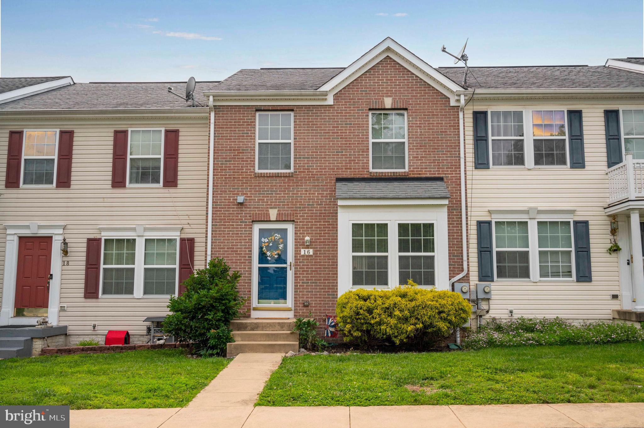 This three bedroom, brick front townhouse has been well-kept by its single-owner and holds an exceptional location adjoining the The Sycamore and Van Metre 9 at Stonebridge.  Beautiful inside and out, the home has manicured landscaping, privacy fencing in the rear yard, plus a deck and patio for additional outdoor living space.  The interior features a small bump out in the main level living area for added daylighting, beautiful hardwood flooring, a powder room for convenience, and newly updated appliances in the kitchen.  The upper level has a large owner's suite and two guest bedrooms that share a second full bathroom, while the finished lower level has easy access to the rear patio and includes another flexible entertainment space plus a third full bathroom.  Move-in ready and packed full of upgrades - this home is a standout - come see for yourself!