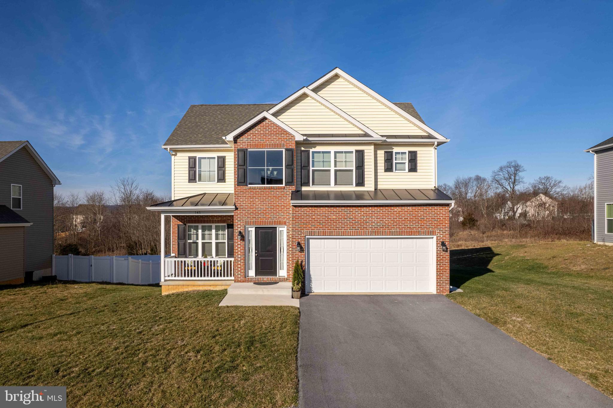 ***The seller is providing a $10,000 contribution towards the buyer's closing costs or rate buy-down with a full priced offer.***  

Welcome home to this charming FIVE bedroom single family home in the new Stoney Ridge Community! Move right into a new build style home just two years young without the builder wait! This pristine home features laminate flooring throughout the main level, a two story foyer, gorgeous front porch perfect for enjoying your morning cup of coffee, beautiful sun room that leads to the second story deck, large primary suite with ensuite bathroom and walk in closet, upper level laundry for convenience, completely finished basement with fifth bedroom, full bathroom, additional family room, and storage. It doesn't stop there, walk out of the finished basement to a concrete patio and large backyard. With close proximity to schools, restaurants, and major commuter routes, this home has it all! Schedule your private tour today before it's too late!