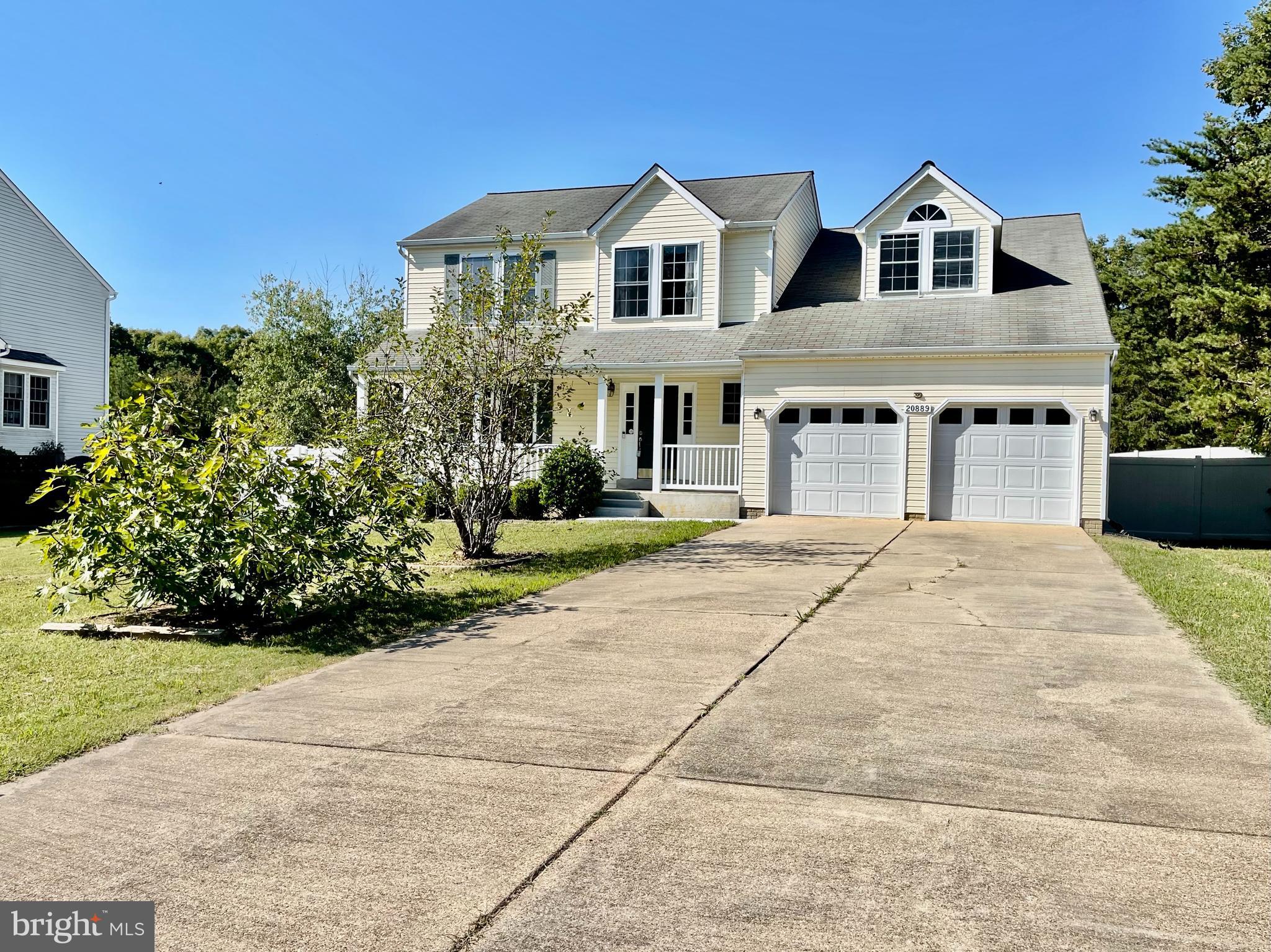 This spacious home features 3 bedrooms and 3.5 bathrooms, providing ample space for comfortable living. The kitchen, complete with a center island, granite countertops and breakfast area, opens to the family room, making it perfect for entertaining. A separate living room and dining room provide additional space for hosting. The primary suite, with a vaulted ceiling, a spacious walk-in closets, and a bathroom with a separate shower and a soaking tub. The finished basement enhances the living space with a recreation room, a full bath, and an office/den. Additional highlights include a two-car garage with new garage doors, a  front porch, a sundeck for outdoor enjoyment, a shed for extra storage, and a fenced rear yard for privacy. Located conveniently for a short commute to PAX NAS, as well as nearby shopping and restaurants, this home truly combines comfort and convenience!
