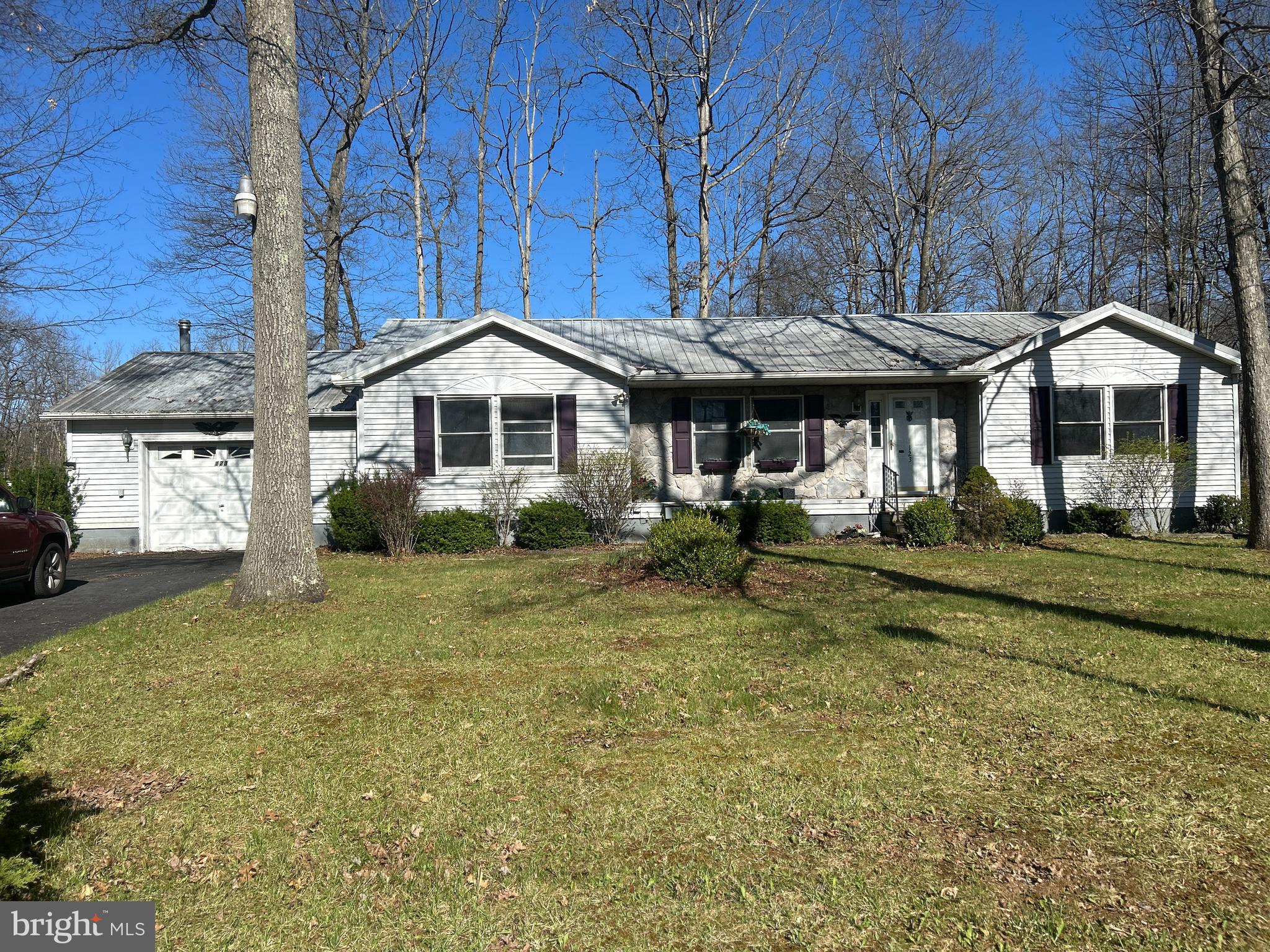 This property is an REO and is being sold in "As Is" condition. 2Bd/2Ba rancher with a 1-car garage, rear deck, and storage shed in the backyard on .27 acres.
Recently painted, new flooring, and light fixtures throughout the house. Remodeled kitchen with new appliances.  Both bathrooms have been updated.