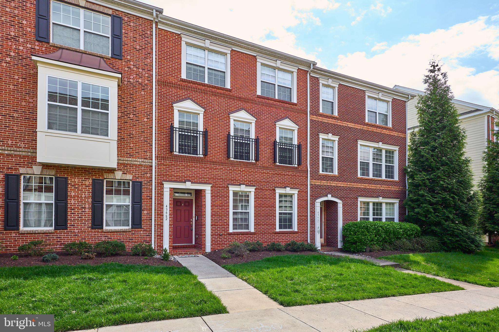 Welcome to Lansdowne Town Center Living!  This spacious 3+Bedroom, 2 Full, 2 Half Bath luxury townhome has it all.  Nestled quietly in the rear of the Lansdowne Town Center, enjoy the adjacent park with walking path to the pond or venture into the Town Center for all your needs from music on the Green to Harris Teeter to Starbucks.  The open floor plan features a bonus room that is perfect for a 4th bedroom with private half bath on the entry level, abundant hardwoods spacious living room, dining room, and gourmet kitchen on the main level, as well as a deck overlooking rear load driveway.  Upper level features 3 spacious bedrooms including primary suite with dual walk-in closets.  Updates include: Freshly painted (2026), New carpet (2026), Roof (2019), HVAC (2018), Water Heater (2021).