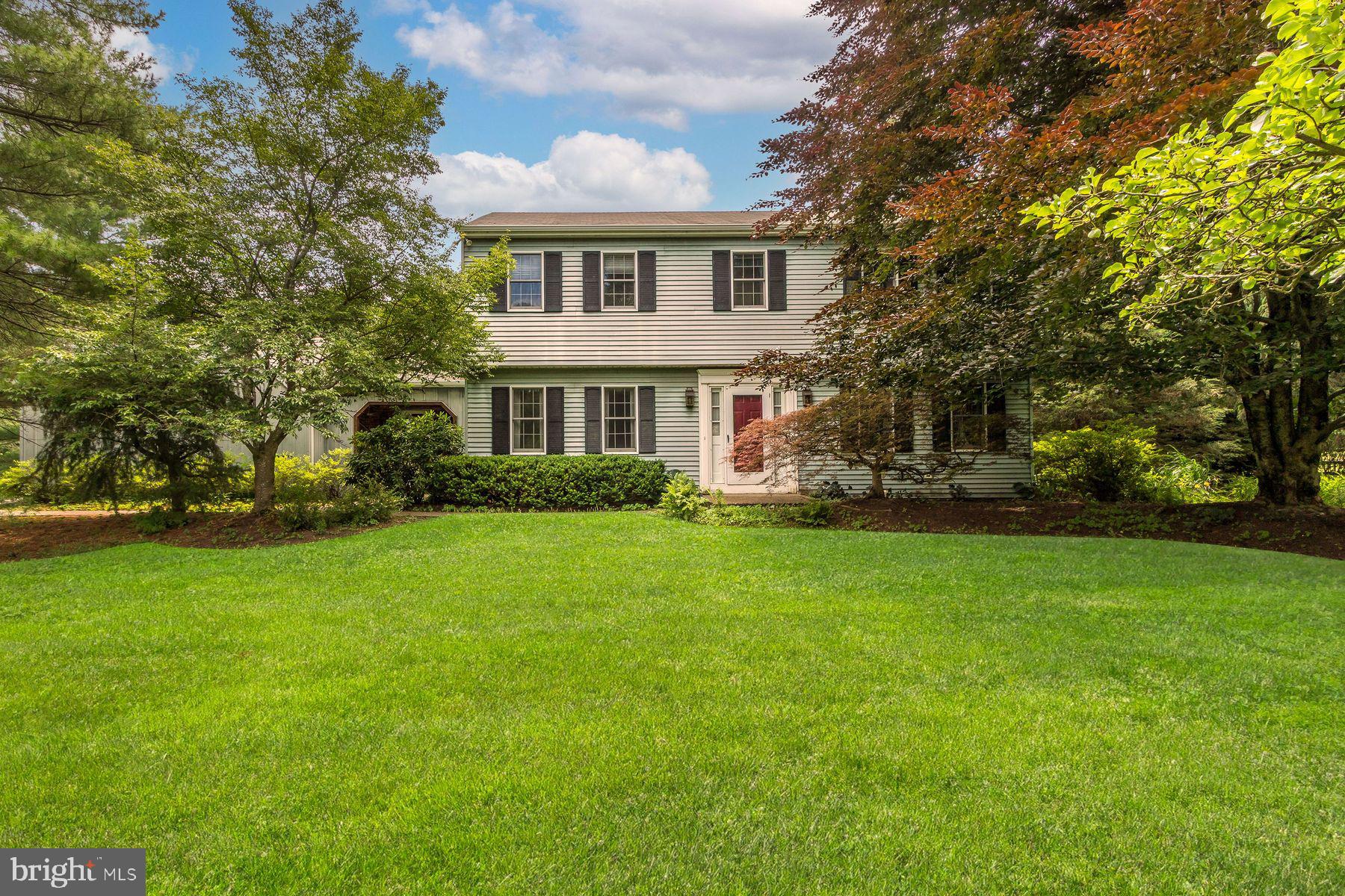 First time on the market, this much-loved home is just waiting for the next family to make it their own.  The 4-bedroom, 2.5 bath home on just under 1 acre is located in a quiet, well-established neighborhood in Buckingham Township. The center hall colonial features a formal living room and formal dining room.  The eat-in kitchen is bright and offers lots of cabinets as well as a pantry.  The kitchen opens to a family room with fireplace/wood burning stove and doors that lead out to the spacious covered terrace with skylights and ceiling fans.  There is also a mudroom/laundry room and powder room on this level.

The second floor has a primary suite with en-suite bath and walk in closet.  There are an additional 3 bedrooms and a second full bath.

The home features a 1 bedroom apartment over the attached 2 car garage adding an additional flexible living space.  The property has beautiful lawns with mature trees and plantings as well as a landscaped waterfall and stream which meanders through the gardens.  There is a large in-ground pool with a small pool house perfect for storing pool equipment and lounge chairs.  

Located in the desirable Central Bucks School District and just minutes from downtown Doylestown, this property provides easy access to parks, schools, shopping, dining, museums and a large variety of cultural family activities