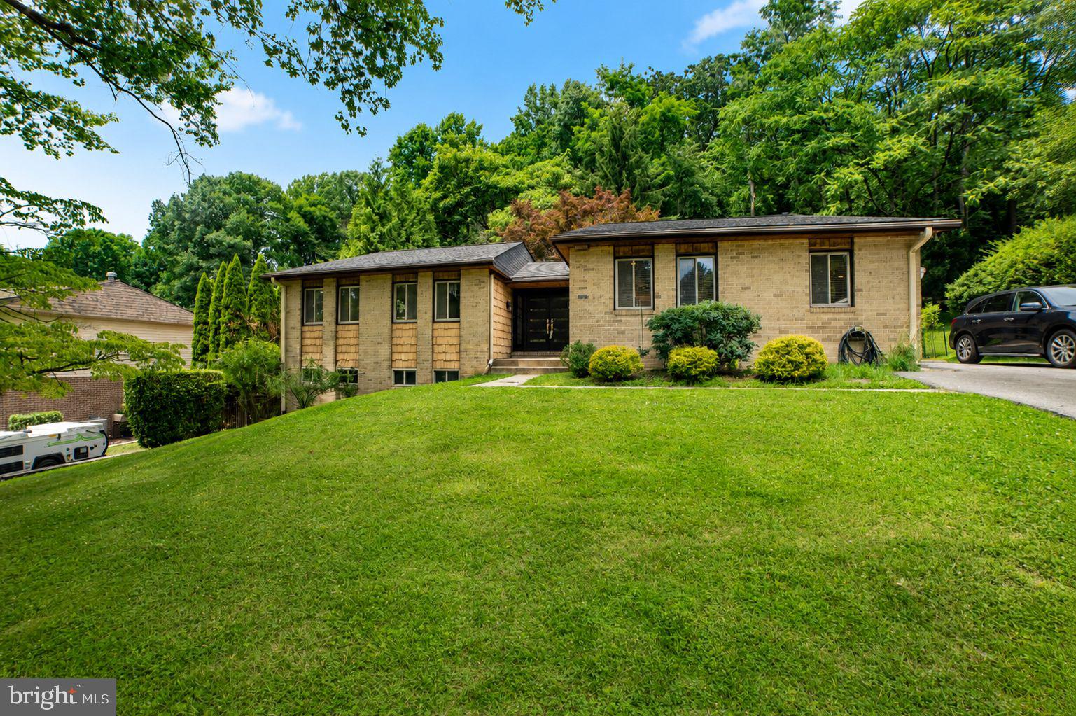 Nestled on a quiet dead-end street backing directly to a protected forest, this beautifully updated home offers 3,600 total sq. ft. of living space in a highly desirable neighborhood. Enjoy total peace of mind with major updates, including a new roof 2025, newly paved driveway, waterproofed lower level and a pre-installed EV charger.
You'll find freshly painted interiors, gorgeous main-level wood floors, 3 spacious bedrooms (easily convertible to 4 or 5!) alongside 3 full baths. This home offers ultimate convenience just a 2-minute drive to Quarry Lake shopping, with incredibly easy access to Greenspring Station, I-83, and I-695.