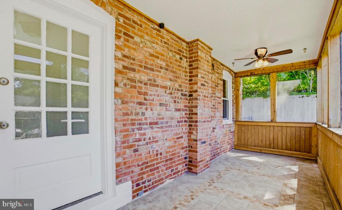 Exceptional Rockville location—walk right through your back gate into Hillcrest Park! Recently refreshed and lovingly maintained, this classic brick Cape Cod in the heart of Rockcrest is move-in ready. Enjoy brand-new windows, beautiful new flooring across the entire upper level, and a crisp, clean slate with professional interior paint and exterior stain. The bright main floor features original hardwood floors, two bedrooms, a full bathroom, a cozy living room, and an eat-in kitchen with a convenient adjacent washer/dryer, while the spacious upstairs serves as a private primary bedroom or flexible bonus space. For extra storage, the home includes an outdoor shed and a clean crawlspace with a vapor barrier. Step outside into the fully fenced backyard, an absolute highlight where you can relax on the inviting screened-in porch or enjoy perfect afternoon shade during the summer heat. Situated on a remarkably quiet street with friendly neighbors you’ll know by first name, you get the peace of a tight-knit community with the perks of urban living; this commuter’s dream is just minutes from two Metro stations and an easy walk to the grocery store, schools, and fantastic neighborhood restaurants.