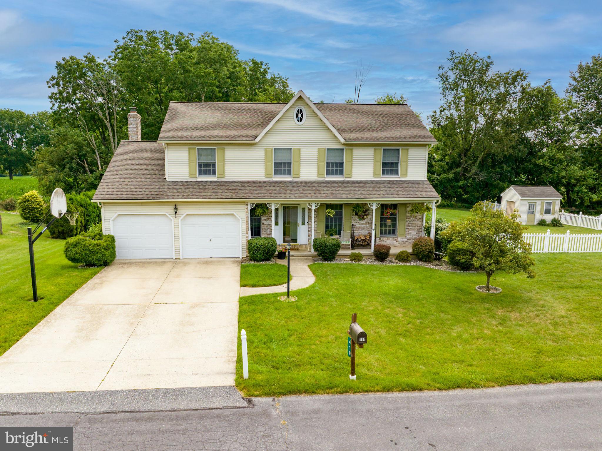 Open House, Saturday & Sunday from 1:00-3:00 pm! Discover the perfect blend of peaceful surroundings and everyday convenience in this beautifully maintained 4-bedroom ,3 1/2 Bath Colonial in the Nazareth Area School District. Tucked into a neighborhood with a country feel, yet just minutes from shopping, restaurants, Routes 33 and 22, this home offers the best of both worlds. The heart of the home is the eat-in kitchen with granite countertops, tile flooring, and a sunny breakfast nook overlooking the backyard. Just steps away, the inviting family room features hardwood floors, a classic brick wood-burning fireplace, and French doors leading to a two-tier deck, Pavilion-covered patio, partially fenced yard, raised garden bed, playset, and storage shed make this home ideal for entertaining or simply enjoying the outdoors. The first floor also offers a welcoming foyer, formal living room with crown molding, formal dining room, and a convenient half bath. The upstairs spacious primary suite is a true retreat, featuring a walk-in closet and an impressive ensuite bath with double sinks, a soaking tub, skylights, and a vaulted ceiling. Three additional generously sized bedrooms share a hall bath with double sinks and the convenience of a second-floor laundry area. The partially finished basement expands the living space with a recreation room, office, bonus room, and full bath, while still providing ample storage and a workshop complete with air compressor piping for your tools. An oversized two-car garage with attic storage completes this exceptional property. Updates include Septic in 2020, Heat pump in both indoor and outdoor unit in 2019 and Roof in 2016. Offering flexible living spaces, abundant storage, and a location that combines tranquility with convenience, this home is ready for its next chapter.