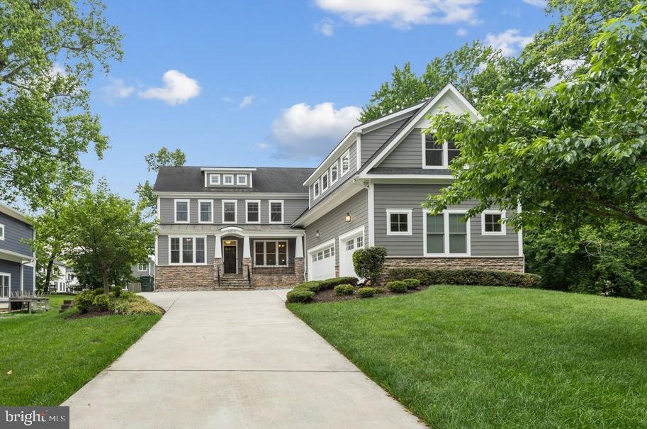 **OPEN HOUSE - Saturday 7/11 and Sunday 7/12 from 2 to 4 pm**NESTLED on a private cul-de-sac in McLean, this exceptional custom built home offers over-the-top comfort, timeless design, amazing privacy, and luxurious living across three finished levels. With 7 bedrooms, 5.5 Baths, thoughtfully designed indoor and outdoor spaces, this home perfectly blends elegance and functionality. A classic, light-filled foyer welcomes you inside, flanked by an elegant living room with custom-built-ins and a dining room featuring beautiful custom millwork.  At the heart of the home, the sun-drenched gourmet kitchen is designed for both everyday living and effortless entertaining, featuring an oversized island with bar seating, quartz countertops, a walk-in pantry, breakfast area, and seamless access to the screened porch for year-round enjoyment. The inviting family room opens to the kitchen and showcases a stunning fireplace with a wall of custom built-ins, tray ceiling, and direct access to the rear deck. A desirable main-level en suite provides flexibility for guests or multigenerational living, while a mudroom, half bath, and access to the attached 3-car garage complete the main level. Upstairs, the luxurious primary suite serves as a true retreat, highlighted by a tray ceiling, spa-inspired bath with soaking tub, frameless glass shower, dual vanities, and an expansive custom walk-in closet. Three additional generously sized bedrooms, each with large walk-in closets, are complemented by two full baths and a spacious media room or private office. A convenient laundry room is on this level with cabinets for storage. The fully finished lower level is designed for recreation and relaxation, featuring a sprawling rec room, dedicated endless pool room, exercise room, additional bedroom and full bath, plus walk-up access to the beautifully landscaped backyard. Outdoor living is equally impressive with a large deck, screened porch, flagstone patio with firepit, and a fully-fenced yard offering exceptional privacy and space to entertain.  Custom programmable automatic blinds in the family room, kitchen, breakfast area, and staircase are thoughtfully designed to open at sunrise and close at sunset for effortless comfort and convenience.  Built by Focal Point Homes. The property backs directly onto Kent Gardens Park and is just a short walk to Kent Gardens Elementary School.  Ideally located near the heart of McLean and Tysons, with easy access to restaurants, shopping, parks, and major commuter routes. Kent Gardens, Longfellow, McLean Schools!