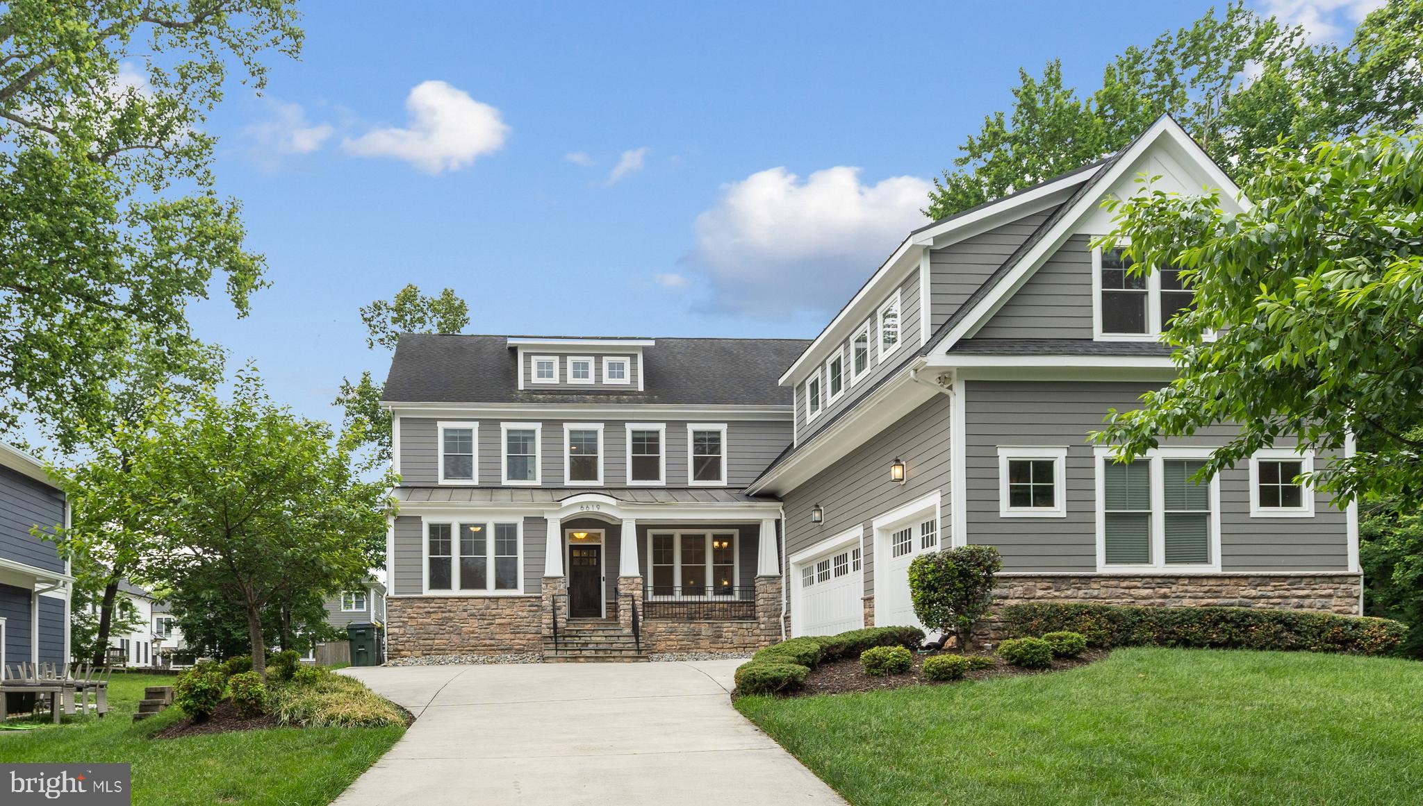 **OPEN HOUSE - Saturday 7/11 and Sunday 7/12 from 2 to 4 pm**NESTLED on a private cul-de-sac in McLean, this exceptional custom built home offers over-the-top comfort, timeless design, amazing privacy, and luxurious living across three finished levels. With 7 bedrooms, 5.5 Baths, thoughtfully designed indoor and outdoor spaces, this home perfectly blends elegance and functionality. A classic, light-filled foyer welcomes you inside, flanked by an elegant living room with custom-built-ins and a dining room featuring beautiful custom millwork.  At the heart of the home, the sun-drenched gourmet kitchen is designed for both everyday living and effortless entertaining, featuring an oversized island with bar seating, quartz countertops, a walk-in pantry, breakfast area, and seamless access to the screened porch for year-round enjoyment. The inviting family room opens to the kitchen and showcases a stunning fireplace with a wall of custom built-ins, tray ceiling, and direct access to the rear deck. A desirable main-level en suite provides flexibility for guests or multigenerational living, while a mudroom, half bath, and access to the attached 3-car garage complete the main level. Upstairs, the luxurious primary suite serves as a true retreat, highlighted by a tray ceiling, spa-inspired bath with soaking tub, frameless glass shower, dual vanities, and an expansive custom walk-in closet. Three additional generously sized bedrooms, each with large walk-in closets, are complemented by two full baths and a spacious media room or private office. A convenient laundry room is on this level with cabinets for storage. The fully finished lower level is designed for recreation and relaxation, featuring a sprawling rec room, dedicated endless pool room, exercise room, additional bedroom and full bath, plus walk-up access to the beautifully landscaped backyard. Outdoor living is equally impressive with a large deck, screened porch, flagstone patio with firepit, and a fully-fenced yard offering exceptional privacy and space to entertain.  Custom programmable automatic blinds in the family room, kitchen, breakfast area, and staircase are thoughtfully designed to open at sunrise and close at sunset for effortless comfort and convenience.  Built by Focal Point Homes. The property backs directly onto Kent Gardens Park and is just a short walk to Kent Gardens Elementary School.  Ideally located near the heart of McLean and Tysons, with easy access to restaurants, shopping, parks, and major commuter routes. Kent Gardens, Longfellow, McLean Schools!