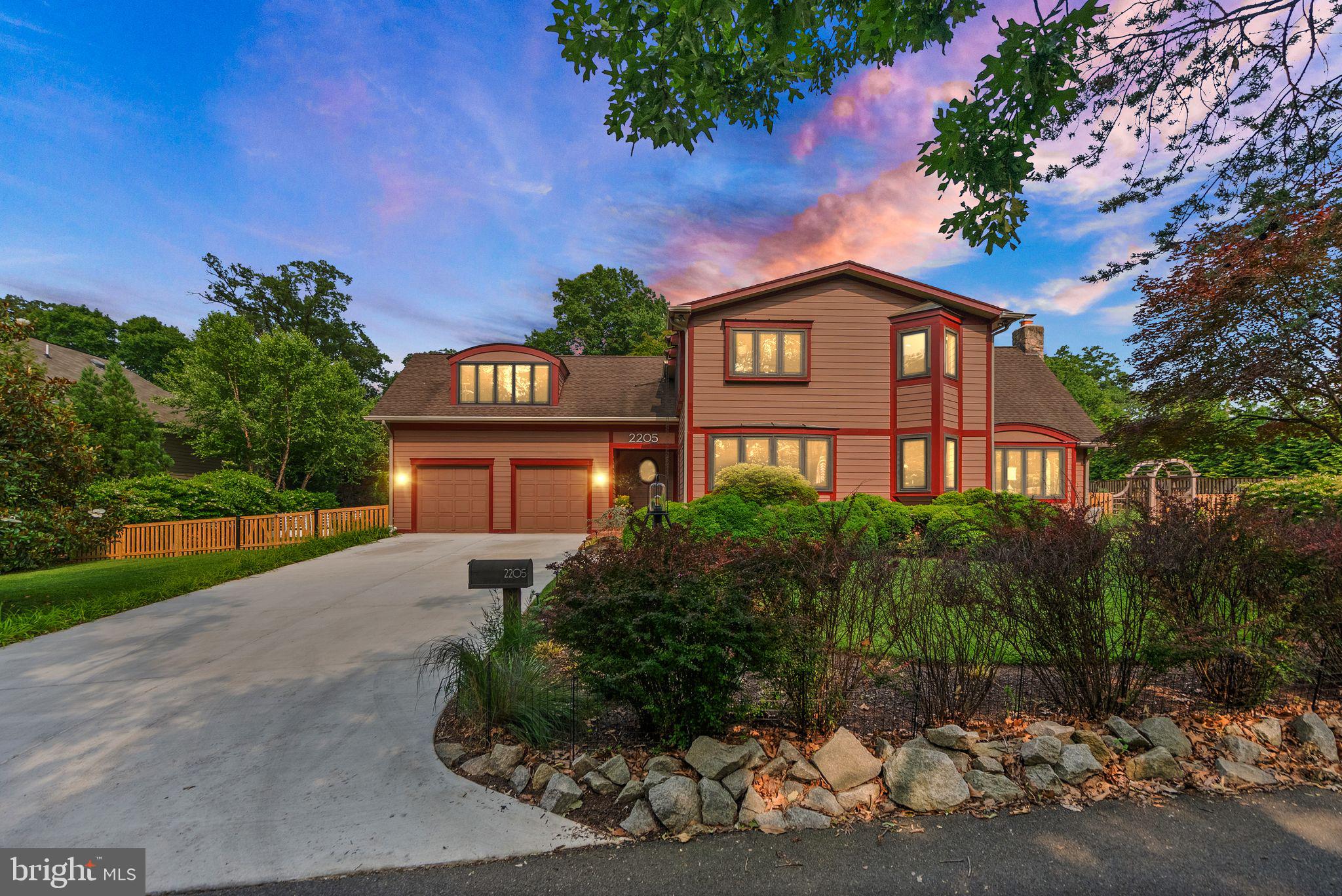 Renovated Craftsman | Two Main Suites | Two Home Offices | Fenced Yard | Wooded Buffer

Step into a storybook setting in the heart of Alexandria—where timeless craftsmanship, modern luxury, and garden serenity collide. Welcome to 2205 Ivor Lane, a renovated Craftsman tucked into a peaceful enclave with a rare fenced yard and wooded buffer, offering unmatched privacy and over $500,000 in thoughtful upgrades.

Reimagined for today’s discerning buyer, the home features a designer kitchen with a professional-grade Ilve gas range, custom cabinetry, and artisan finishes. Vintage touches like Art Nouveau sconces and a salvaged stained-glass door pair beautifully with modern lines.

Enjoy two main suites—one on each level—ideal for multigenerational living or private guest space with a separate lower-level entrance. Sunlight fills the home through expansive glass, showcasing two fireplaces, oak details, and spacious living areas.

Outside, discover patios, blooming trees, a vegetable garden, and a whimsical moongate—a peaceful retreat year-round.

Notable Features:
Two home offices + flex room
 Dual laundry rooms
 On-demand hot water + whole-house water softener
 Nest smart security + upgraded tech
 Oversized 2-car garage + wide driveway

All just minutes to Braddock, Van Dorn, Old Town, National Landing, and DC. Nearby Fort Ward Park offers trails, playgrounds, and a charming museum. 

This home isn’t just beautiful—it’s a lifestyle.