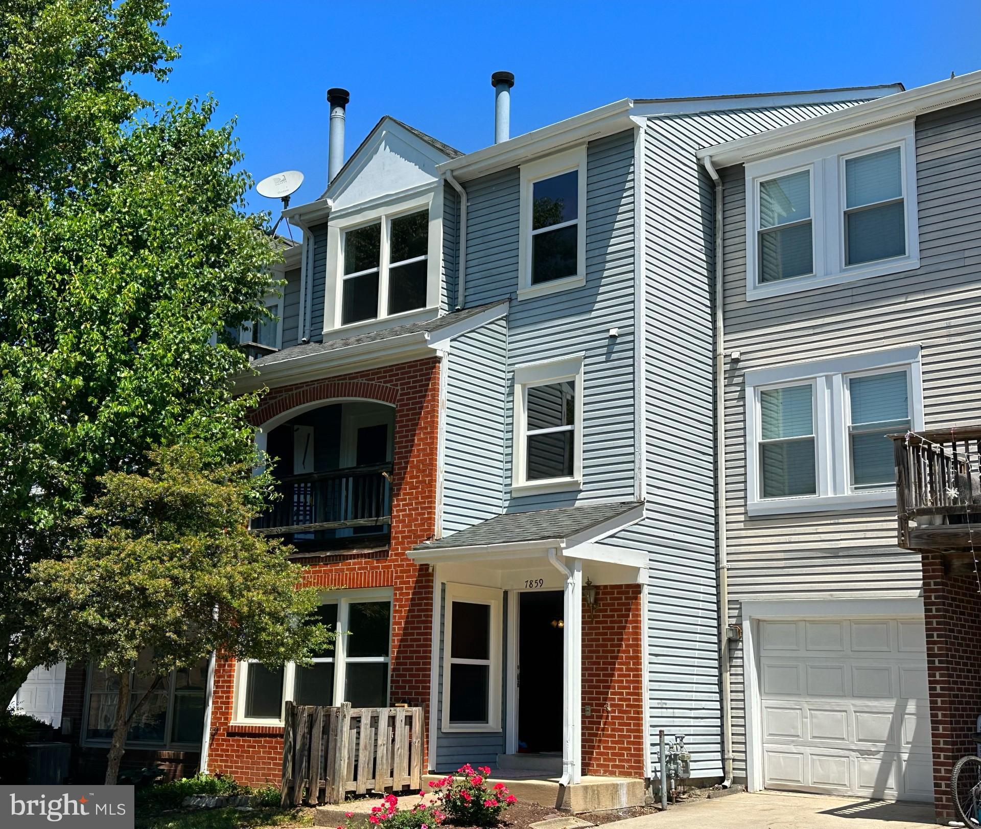 New renovated spacious and bright three-level townhouse, beautiful, mint, ready to move-in.  Entire house freshly painted, all windows newly replaced, 3 bedrooms, 2.5 bathrooms, one-car attached garage plus one parking tag for the 2nd car.  Vaulted ceiling on top 3rd floor, w/2 skylight windows. Lot of useful closets in this house.

Main level new luxury vinyl wood floor, updated kitchen comes with new countertops, new sink, new dishwasher, new range hood. half bath upgraded, wood burn fireplace. Bright from big window.

Second floor:  nice size master bedroom with private balcony and ample closet space. The master bathroom is equipped with a spacious countertop and a brand-new Delta shower kit. D/W on 2nd floor.

Third floor: two bedrooms and a second full bathroom, also equipped with a brand-new Delta shower kit.  High ceiling with new light on hallway.

New carpet adds comfort to the upper levels.

Enjoy low-maintenance living, as the condo association covers exterior building maintenance, water, trash, snow removal, and lawn care. Community amenities include an outdoor pool. Ideally located close to major commuter routes (I-66 and 234), the VRE, parks, a regional library, shopping, dining, and hospital.