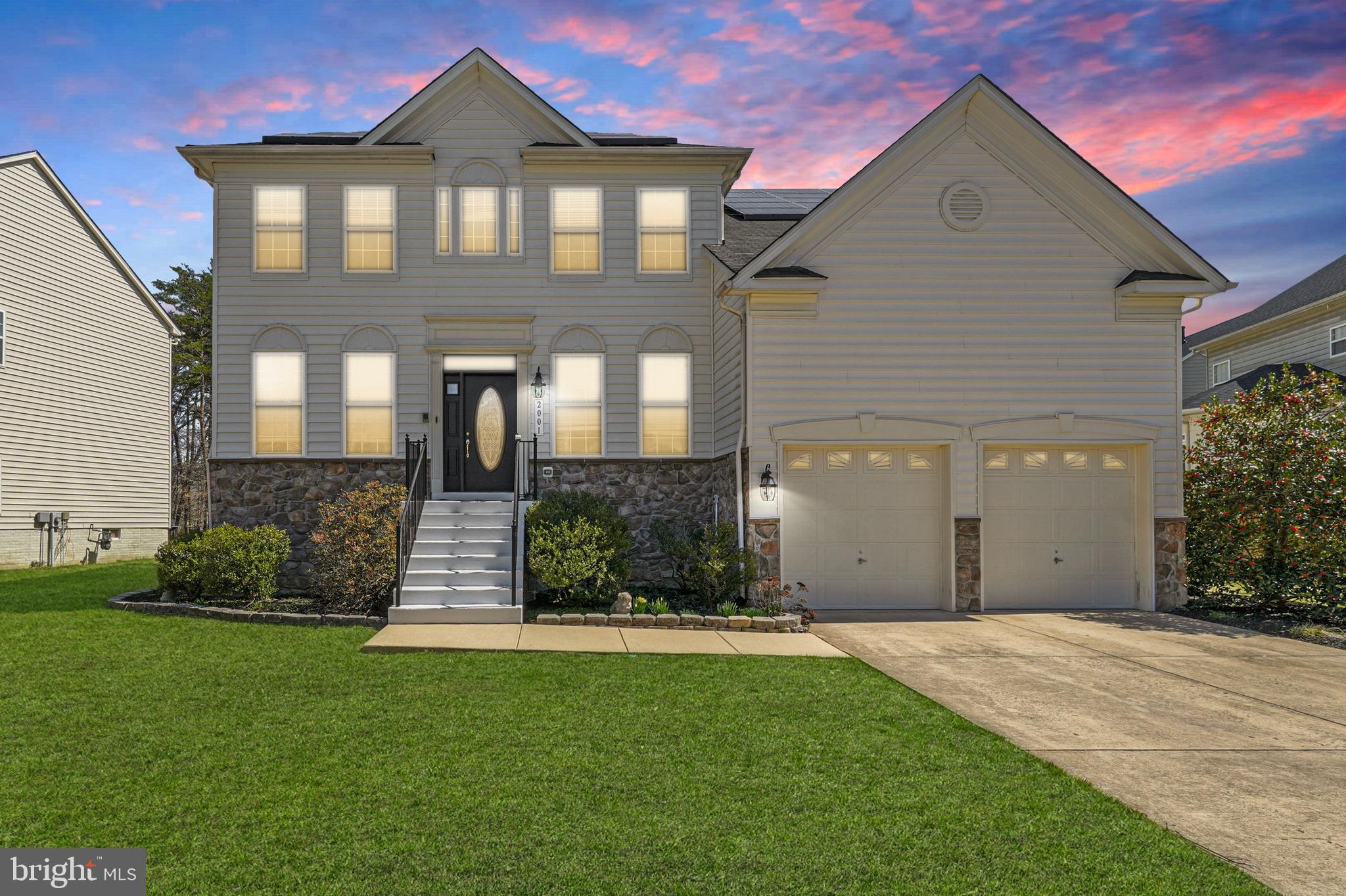 Experience Unmatched Luxury Living!

Step into this immaculate single-family home, where every detail has been designed for comfort and elegance. From the moment you enter, you're greeted by beautiful hardwood floors that flow seamlessly throughout the main level. The open-concept kitchen is a chef's dream, featuring a large island with a cooktop, perfect for cooking and entertaining. Enjoy casual meals or study at the island, while natural light pours in through the many windows, creating an inviting atmosphere.

Just off the kitchen, the spacious living room is the ideal place to unwind by the fireplace on chilly evenings. A conveniently located half bath on this level adds extra comfort and practicality. Upstairs, you'll find four expansive bedrooms, including the luxurious primary suite. A true retreat, the ensuite bathroom offers a jetted tub, stand-up shower, large double vanity, and a separate toilet room for added privacy. The walk-in closet is massive—your personal dressing room!

The upper level also boasts a laundry room, plus three additional spacious bedrooms and two full baths. But that's not all—head to the basement, where two additional rooms await, perfect for a bedroom, rec room, or home office. This large area is ideal for entertaining, with a bonus kitchen featuring stainless steel appliances, a full and half bath, and endless possibilities for creating your dream space.

Step outside to the private, fenced-in backyard with a deck perfect for summer BBQs. The 2-car garage and extra driveway parking provide ample space for all your needs.

This home is the epitome of luxury living, with room for every lifestyle and every need. Don't miss the chance to make this one-of-a-kind property yours—schedule your private tour today!