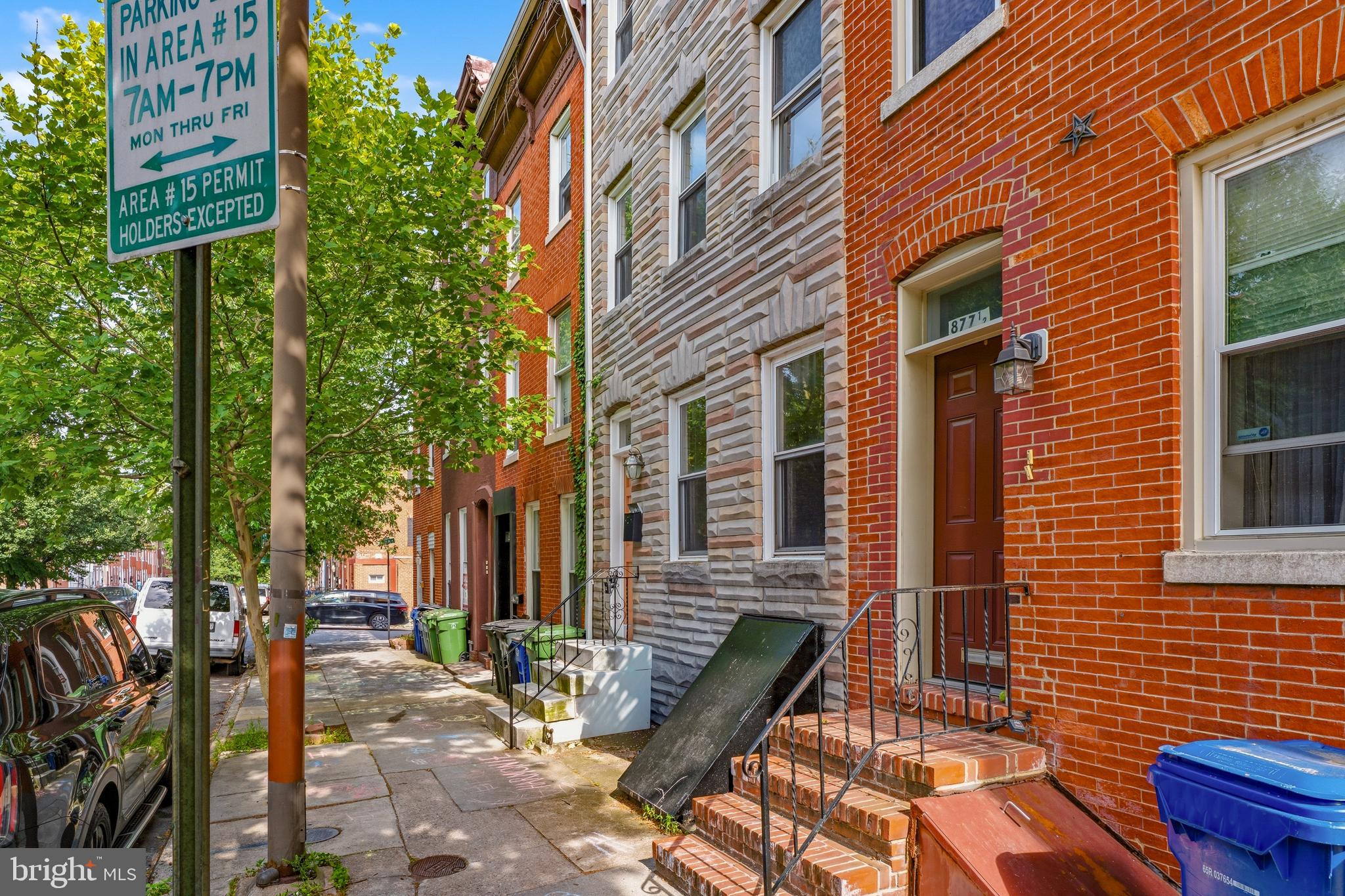 Charming Baltimore City Rowhome with Character and Convenience! Step inside to find beautiful exposed brick walls,  hardwood floors, and a warm country-style kitchen featuring stainless steel appliances. The main level offers the convenience of a laundry area and a half bath. Upstairs, the second floor features two comfortable bedrooms and a spacious full bath complete with a soaking tub and separate shower. The third level provides two additional bedrooms, offering flexibility for guests, a home office, or hobby space. Relax outdoors on the rear deck overlooking the backyard—perfect for entertaining or enjoying your morning coffee. Conveniently located near the University of Maryland, Downtown Baltimore, Camden Yards, M&T Bank Stadium, dining, shopping, and major commuter routes.