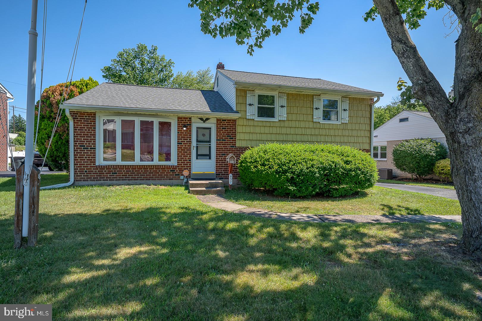 Here you go:
Welcome to 437 Rittenhouse Circle — a solid split-level home on a nearly half-acre lot in one of Havertown's most established neighborhoods. Built in 1955 with a classic brick and cedar shake exterior, this 3-bedroom, 1.5-bath home offers 2,015 square feet of living space and tremendous potential, all within the award-winning Haverford Township School District.
Hardwood floors flow through the entry foyer, living room, and into the dining room. The bright living room features a large picture window and ceiling fan, while the dining room offers a chandelier and sliding glass door to the rear deck. The eat-in kitchen includes a center island with breakfast bar seating, gas range, dishwasher, microwave, and an open connection to the dining area. Upstairs, three well-sized bedrooms each feature hardwood floors and ceiling fans. The primary bedroom includes crown molding and a closet, and the additional bedrooms are served by a full hall bath with tub/shower and updated vanity. A linen closet and additional storage round out the upper level.
The lower level offers a spacious bonus room with exposed brick, wood-paneled walls, built-in shelving, beamed ceiling, and a half bath — perfect for a home office, recreation room, or media space. A full crawl space provides ample additional storage. Outside, the nearly half-acre lot (21,344 sq ft) is a rare find in Havertown — wide front yard, mature shade trees, paved driveway with off-street parking, and plenty of room to enjoy the outdoors.
Just nine miles west of Center City, Havertown offers walkable neighborhoods, top-ranked schools, and easy access to SEPTA transit and major roadways. The Haverford Township School District ranks in the top 5% in Pennsylvania. Solid bones, classic character, an oversized lot, and an unbeatable location — 437 Rittenhouse Circle is ready for its next chapter. Being sold as-is; bring your vision and make it your own!
