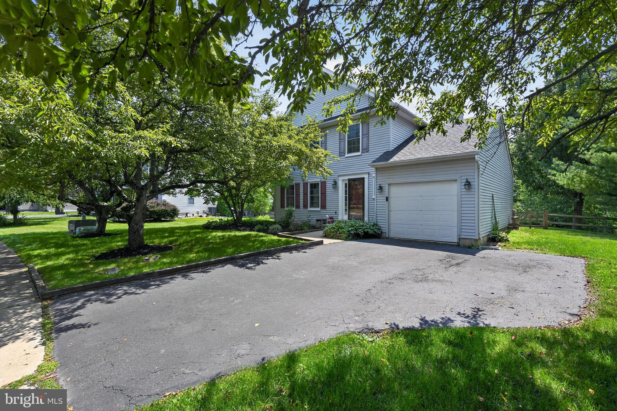 Welcome to this charming Colonial nestled on a quiet cul-de-sac in the highly desirable Sweetbriar neighborhood, within the Quakertown Community School District. Situated on a premium lot backing to open space, this home offers exceptional privacy along with a spacious, fully fenced backyard perfect for entertaining, relaxing, or everyday enjoyment.
Step inside to a welcoming foyer with ample storage. To the left, a bright and inviting living room flows seamlessly into the formal dining room, creating an ideal layout for gatherings. A convenient powder room is located just off the foyer. The spacious kitchen features abundant cabinetry, generous counter space, and an open design that overlooks the cozy family room, complete with a wood fireplace. A first-floor laundry room provides direct access to the attached one-car garage.
Upstairs, the expansive primary suite offers a walk-in closet and a private en-suite bath. Two additional generously sized bedrooms and a full hall bathroom complete the second level.
The fully finished basement provides exceptional additional living space, perfect for entertaining family and friends. Whether you're hosting game day, enjoying movie nights, or creating a home gym, this versatile space has it all, including a built-in bar and full-size refrigerator so there's no need to head upstairs.
Outdoor living is just as impressive. A large deck spans the rear of the home, offering plenty of room for outdoor dining, grilling, and entertaining. Backing to open space, the backyard provides a peaceful, private setting, while the fully fenced yard offers a safe place for children and pets to play.
Notable updates include a new HVAC system (2026), new windows (2022), a new roof (2015), and the finished basement with built-in bar.
Ideally located in Richland Township, this home is just minutes from shopping, dining, parks, and major commuting routes, offering the perfect blend of comfort, convenience, and privacy. Don't miss your opportunity to make 1620 Salem Lane your next home!