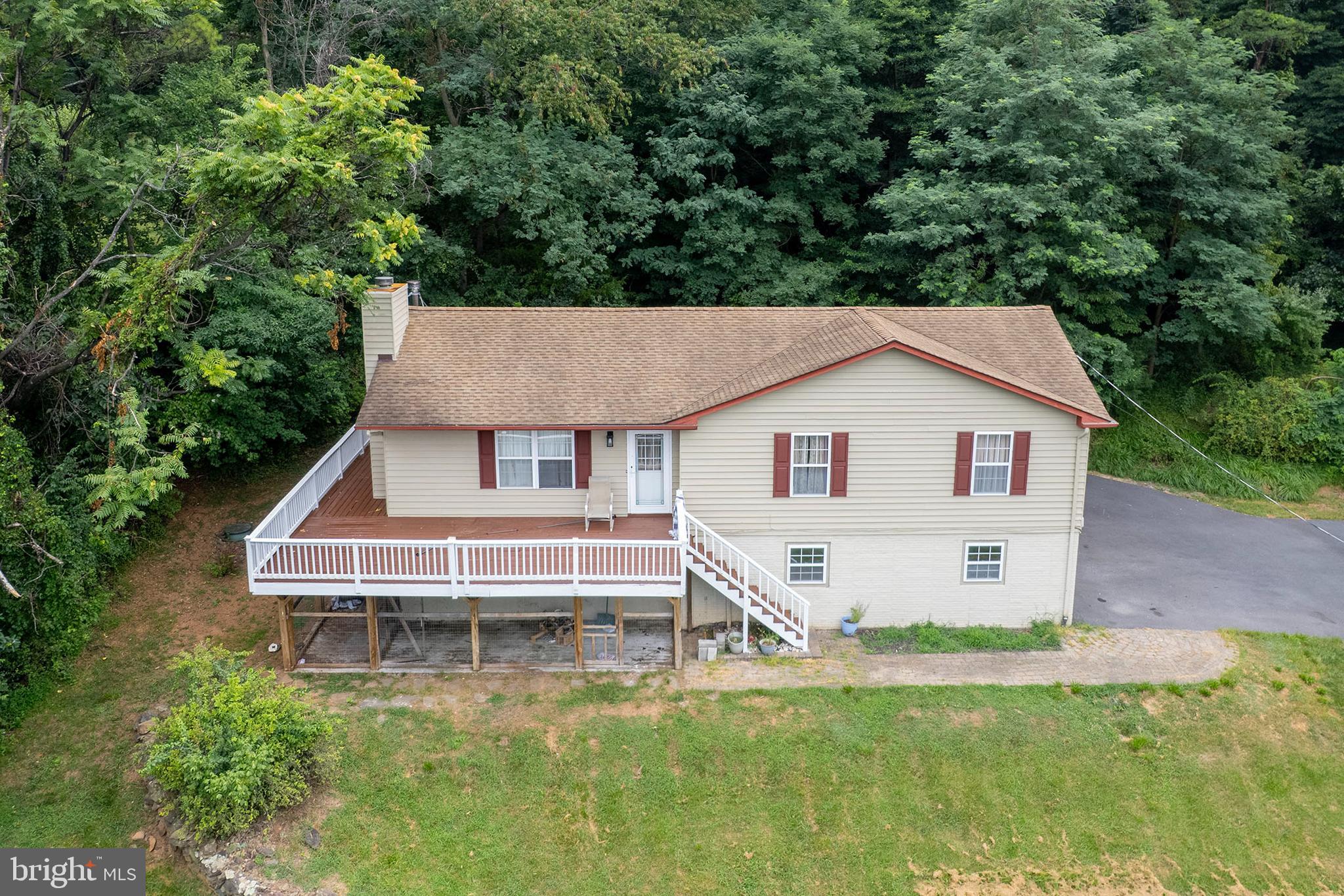 Welcome to this well‑maintained 1995 three‑bedroom home offering two full baths and one half bath, thoughtfully updated for peace of mind and everyday comfort. Major systems have been recently replaced, including a new roof (2015), new HVAC (2024), new well pump (2024), and new hot water heater (2024). The driveway is only 2.5 years old, adding to the home’s excellent curb appeal.

Enjoy a beautiful, open view from the front deck—an inviting spot for morning coffee or relaxing evenings.

Inside, you’ll find fresh paint throughout, creating a bright and move‑in‑ready feel. A wood stove adds warmth and charm, perfect for cozy winter days. The property also features a two‑car garage plus an additional garage, offering ideal space for vehicles, storage, hobbies, or a workshop.

This home blends practical updates with comfortable living—ready for its next owner to enjoy.