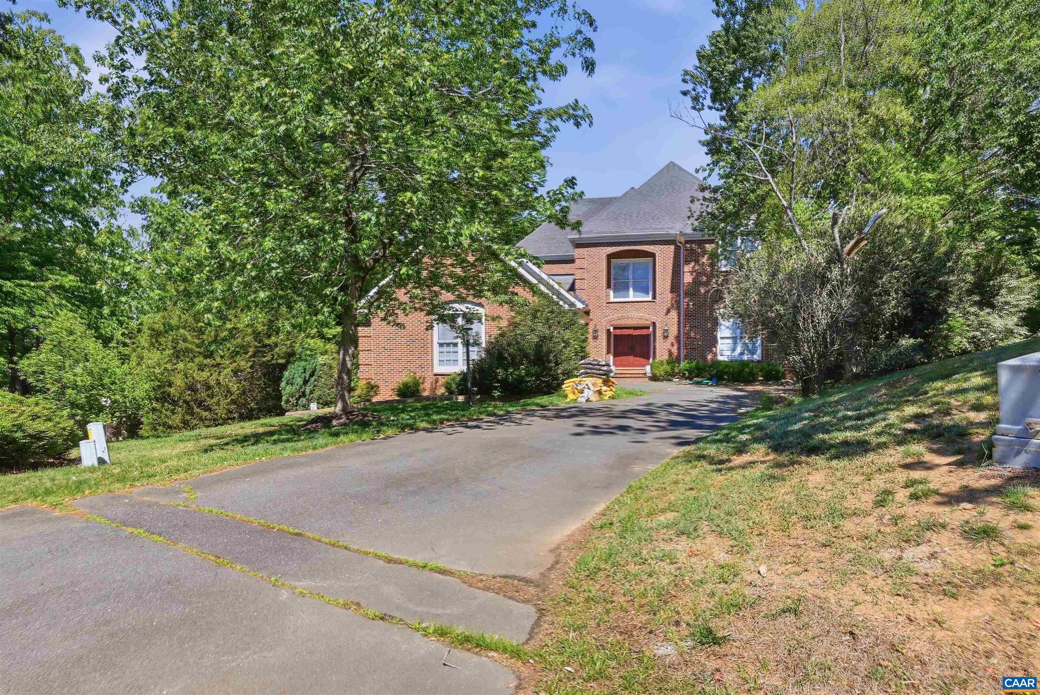 Nestled at the end of a tranquil cul-de-sac in a private equestrian and golf community, this Georgian-style masterpiece boasts exquisite craftsmanship. With three primary suites plus an additional bedroom, the home offers both luxury and comfort. Experience spacious rooms and a floor plan that flows effortlessly throughout. With easy access to Charlottesville and I-64, and surrounded by the rich history of Charlottesville, the stunning Blue Ridge Mountains, and a wealth of nearby wineries, this home is a perfect blend of classic elegance, modern serenity, and a taste of Virginia?s finest.,Granite Counter,Solid Surface Counter,Wood Cabinets,Fireplace in Basement,Fireplace in Great Room
