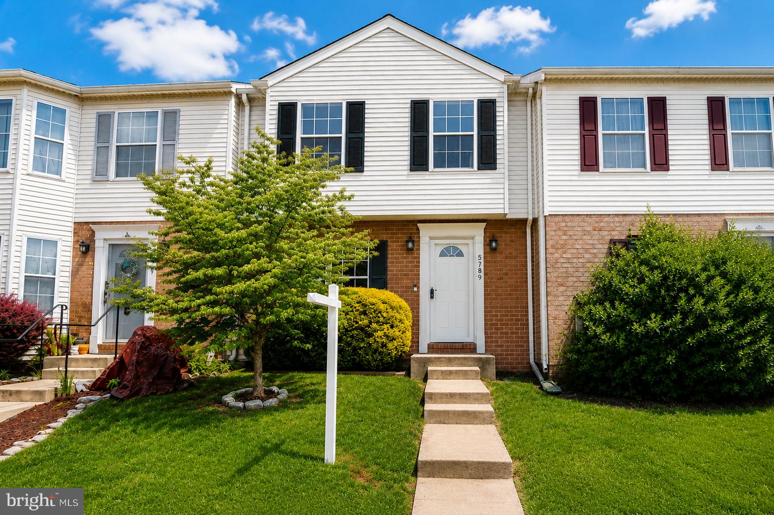 Welcome home to this beautifully maintained three-bedroom, two-and-a-half-bath townhome located in the sought-after Mountain Village community. Offering the perfect blend of comfort, convenience, and community amenities, this home is ready for its next owner.

Step inside to discover a bright and inviting floor plan filled with natural light. The recently updated kitchen features ample counter space, abundant cabinetry, and recently upgraded appliances, creating a stylish and functional space for everyday living and entertaining.

Upstairs, you'll find three generously sized bedrooms, including a spacious primary suite complete with a recently updated private bathroom and generous closet space. Two additional bedrooms and a full hall bathroom provide plenty of room for family, guests, or a home office.

The finished lower level offers a versatile recreation or family room with walkout access to the fully fenced backyard—perfect for relaxing, entertaining, or enjoying outdoor activities in a private setting.

Residents of Mountain Village enjoy an array of community amenities, including a swimming pool, tennis courts, playgrounds, and the convenience of lawn maintenance included through the HOA. Ideally located just minutes from historic downtown Frederick, you'll have easy access to local restaurants, shopping, entertainment, and commuter routes.

Don't miss this opportunity to own a wonderful home in one of Frederick's most desirable communities. With a recently updated kitchen, upgraded appliances, an updated primary bathroom, and a finished walkout lower level, this home offers the perfect combination of modern updates and everyday comfort. Schedule your showing today!