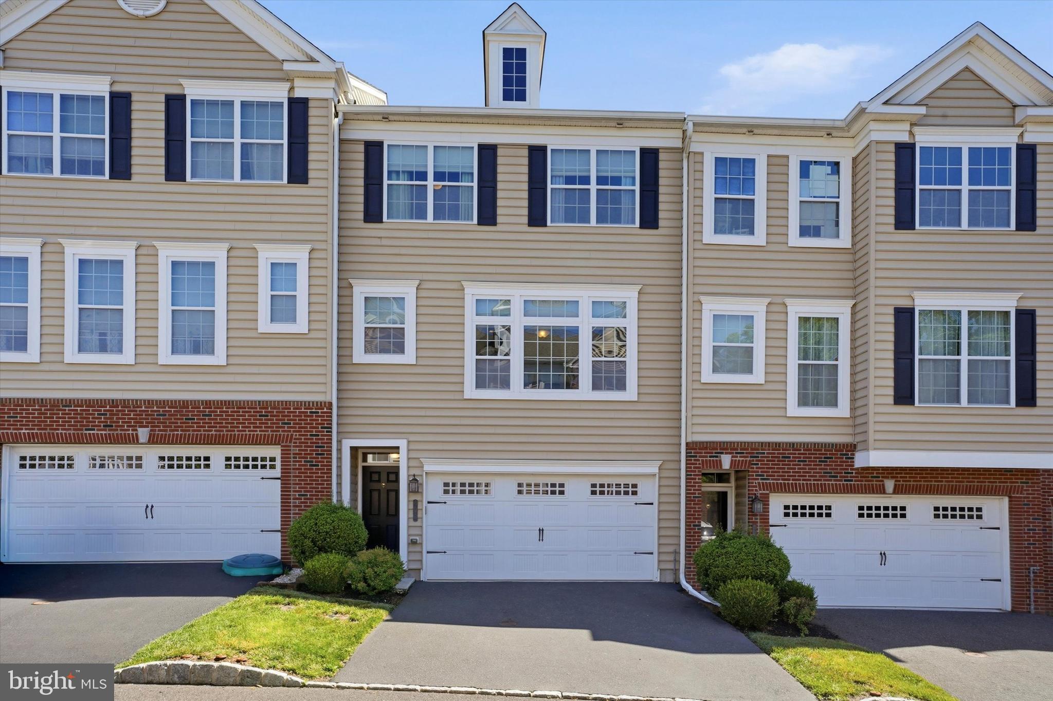 Welcome to 407 Cope Court, a spectacular  townhome located in the highly sought-after Carillon Hill neighborhood of Sellersville Borough. This meticulously maintained residence features three bedrooms and 2.5 bathrooms, offering spacious and comfortable living spaces for you and your family. The entry level of this townhome welcomes you with hardwood flooring. There is a front entry 2 car garage which leads  to a finished lower level which is a great location to take in your favorite game or movie on the TV.  There is a slider off of this lower level which leads to a covered patio.The main floor has a wonderful open floor plan. The family room with ceiling fan/light and high hat lighting  is a great place to unwind after a long day. The kitchen is an entertainers dream!  Beautiful  countertops, plenty of cabinetry, high hat lighting, an island, gas cooking, with new dishwasher  make this the perfect gathering spot for guests. There is an eat-in area in the kitchen, the perfect spot for family meals. Looking for a quiet spot for morning coffee... head out onto the deck with privacy wall. Additionally, a convenient half bathroom on this level adds to the functionality and convenience of the home. Upstairs, you'll find the spacious owners en-suite offering a peaceful retreat complete with ample walk-in  closet  and a private bathroom with double sinks. Two additional bedrooms share a well-appointed hall bathroom, providing comfort and privacy for all residents. Home security system wired in. Plenty of overflow parking nearby.  Experience the epitome of modern living in the sought-after Carillon Hill neighborhood at 407 Cope Court. Don't miss the opportunity to make this lovely townhome your new home in Sellersville Borough. Walking distance to schools, restaurants, Lenape Park, Sellersville Theater. Easy access to major highways. Set your appointment today!.