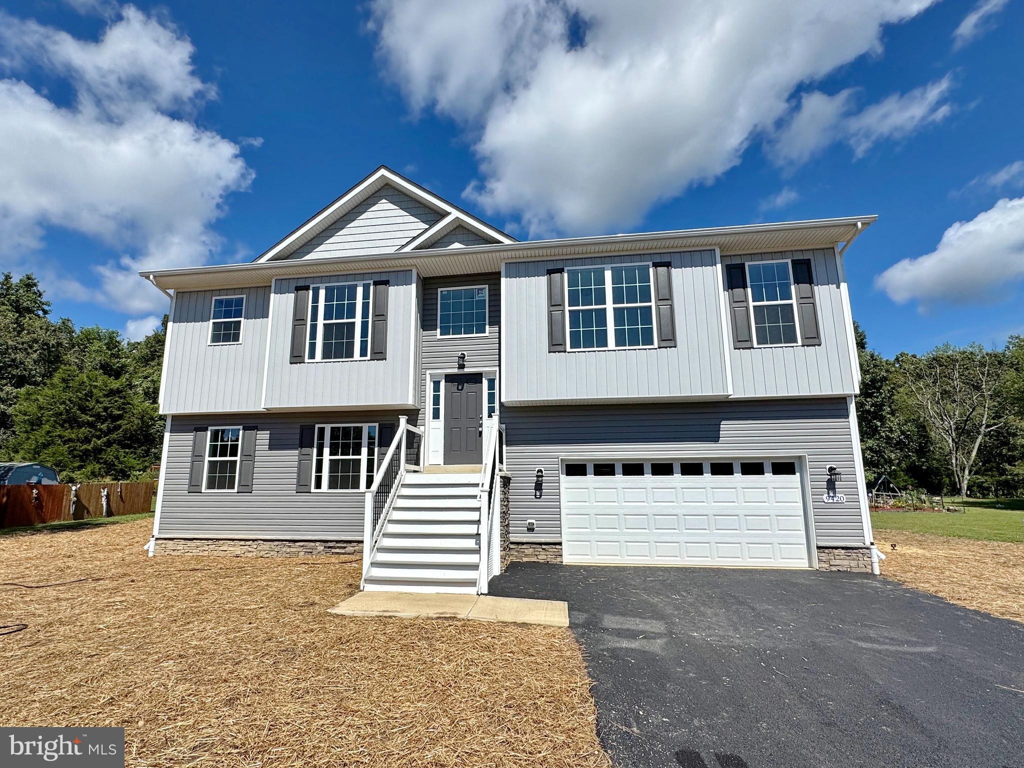 ***No HOA FEES !!! ***Reduced $10,000*** How to Buy A New Home & Make Your Paycheck Last ! Landscaping just finished  Home is now complete and in move in ready , 100% financing available for qualified buyers,    This new home features     3 Bedrooms, 2-1/2 Baths, 2228 sq. ft. +/- very open floor plan  9 ft. ceilings on main level , beautiful upgraded kitchen,  recessed lighting, ceiling fans, Washer / Dryer Enjoy watching football or other functions in your 26 ft. sunken family room along with a cozy Gas Fireplace, huge separate Laundry Room, Oversized Garage ,private  rear yard  backing to trees & much more.