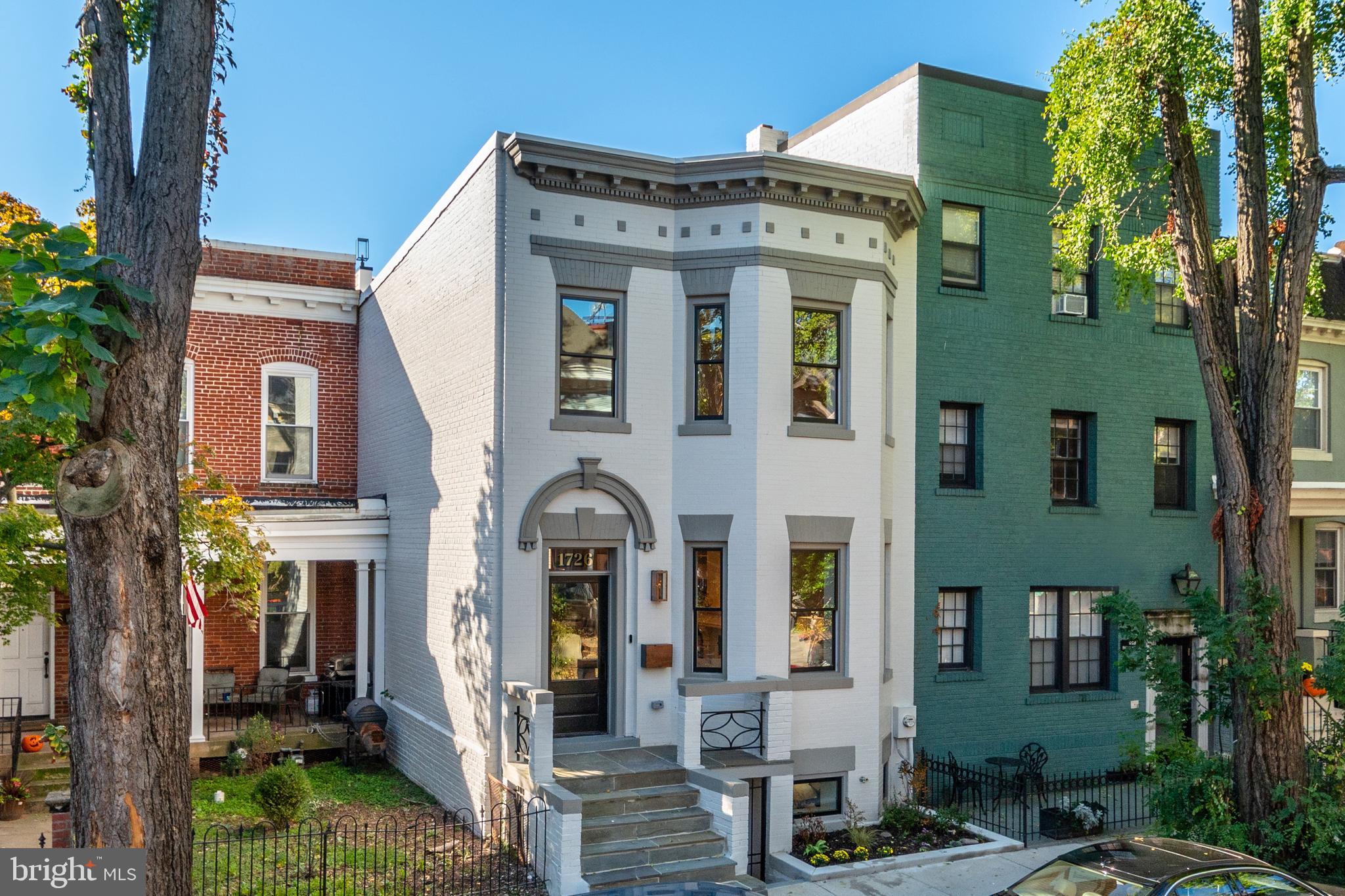 1726 Swann St NW is an incredibly stunning and newly remodeled rowhome in Dupont Circle that showcases 4 Bedrooms, 3.5 Baths, and secure parking. Dilan Homes has transformed and expanded this residence into an impeccable property that spans approximately 3,000 finished square feet throughout 3 levels. With expert craftsmanship and thoughtful design choices, 1726 Swann Street NW presents beautifully with herringbone hardwoods, handpicked stone selections, custom millwork, and enviable outdoor spaces. Quietly set on a one-way street, this block of Swann Street boasts mature tree-lined sidewalks and limited through traffic. Set just around the corner from the classic 17th Street Corridor of Dupont Circle and the popular shops and restaurants on 18th Street, Connecticut Ave, and U Street; this location has much to offer by way of entertainment options and convenient services.