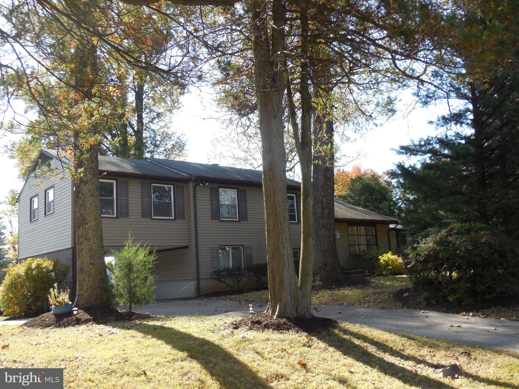 EXCELLENT OPORTUNITY TO PURCHASE 4 LEVEL HOME WITH OVER 2,000 SQ FT +/- ABOVE GRADE COUNTING THE ADDITIONS WITH AN ADDITIONAL 2 LEVELS BELOW GRADE * NEW HVAC 2024 * NEW WATER HEATER 2025 * UPDATED KITCHEN * UPDATED BATHROOMS * 22X13 SUNROOM WHICH LEADS TO THE DECK * 6 CAR PLUS OFF STREET PARKING * LARGE STORAGE BUILDING * NO HOA * NEARLY A 1 ACRE LOT * PRIVATE SETTING BRING YOUR IMAGINATION * BEE KEEPER CURRENTLY USING THE LOWER PORTION OF THE LOT AND WOULD LIKE TO STAY, YOU WOULD BE SUPPLIED WITH FREE HONEY (WILL RELOCATE IF REQUESTED) CLOSE TO ALL CONVENIENCES AND MAJOR ROUTES 795 AND REISTERSTOWN RD