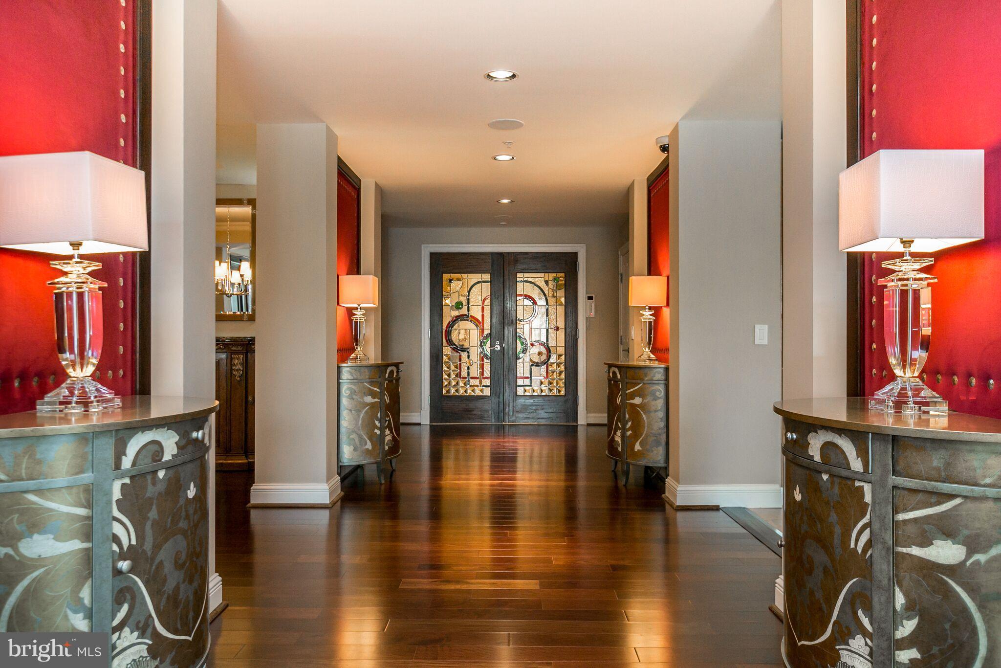 4161 sq ft - No expense spared in this UPSCALE -WATERFRONT Ritz Carlton CONDO! Amenities include: 24 hr. Concierge Services, Custom-made Stained Glass Doors, Auto-Lighting, Custom Wall Coverings, All Glass Back-splash & Double-Edge Granite, Motorized Shades, Oversize Fireplace, Built- In Closets, Private Elevator, Two SIDE BY SIDE deeded parking spaces and more. Call for private showing.