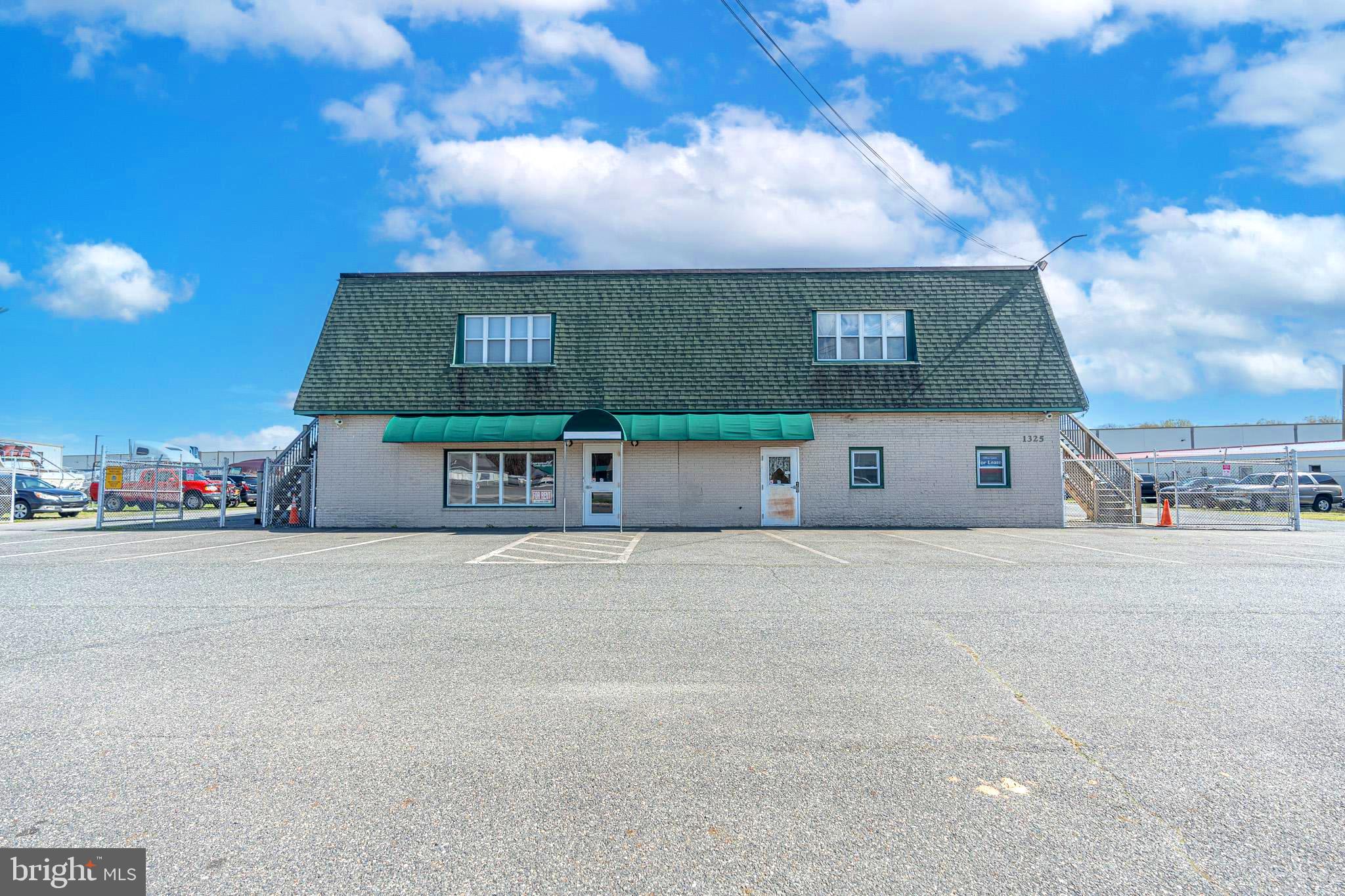 5.03% CAP RATE
4 Unit Mixed Use Commercial and residential
Mixed Use Commercial Property on busy Rt. 40 Pulaski Highway with traffic counts of about 30,000 cars per day featuring almost 1 acre with fenced sides and rear.
Street level consists of 2 commercial spaces (or could be combined for over 9000 square feet)
• Upstairs you will find 2 apartments for additional revenue (3BR/3BA) and (2BR/1BA)