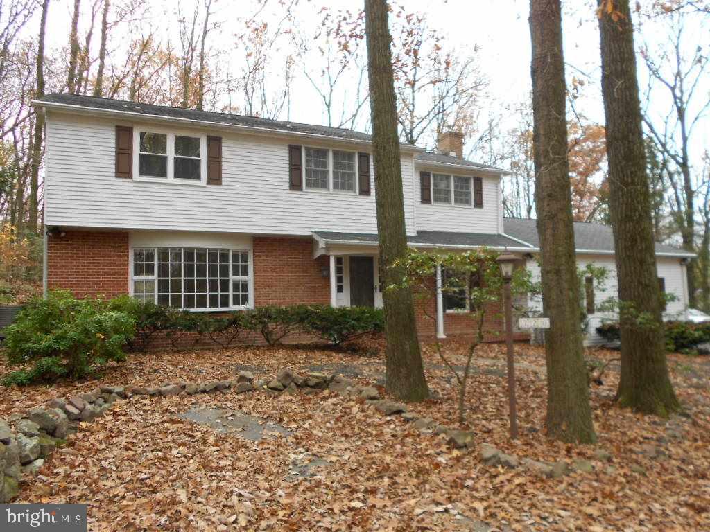 Move right this 4 BR home in Derry Township.  It features updated kitchen and baths, partially finished lower level, hardwood floors, screened in porch, economic heat pump, and storage above the garage.  It is situated on a 1/2 ac wooded lot and is ready for immediate occupancy.