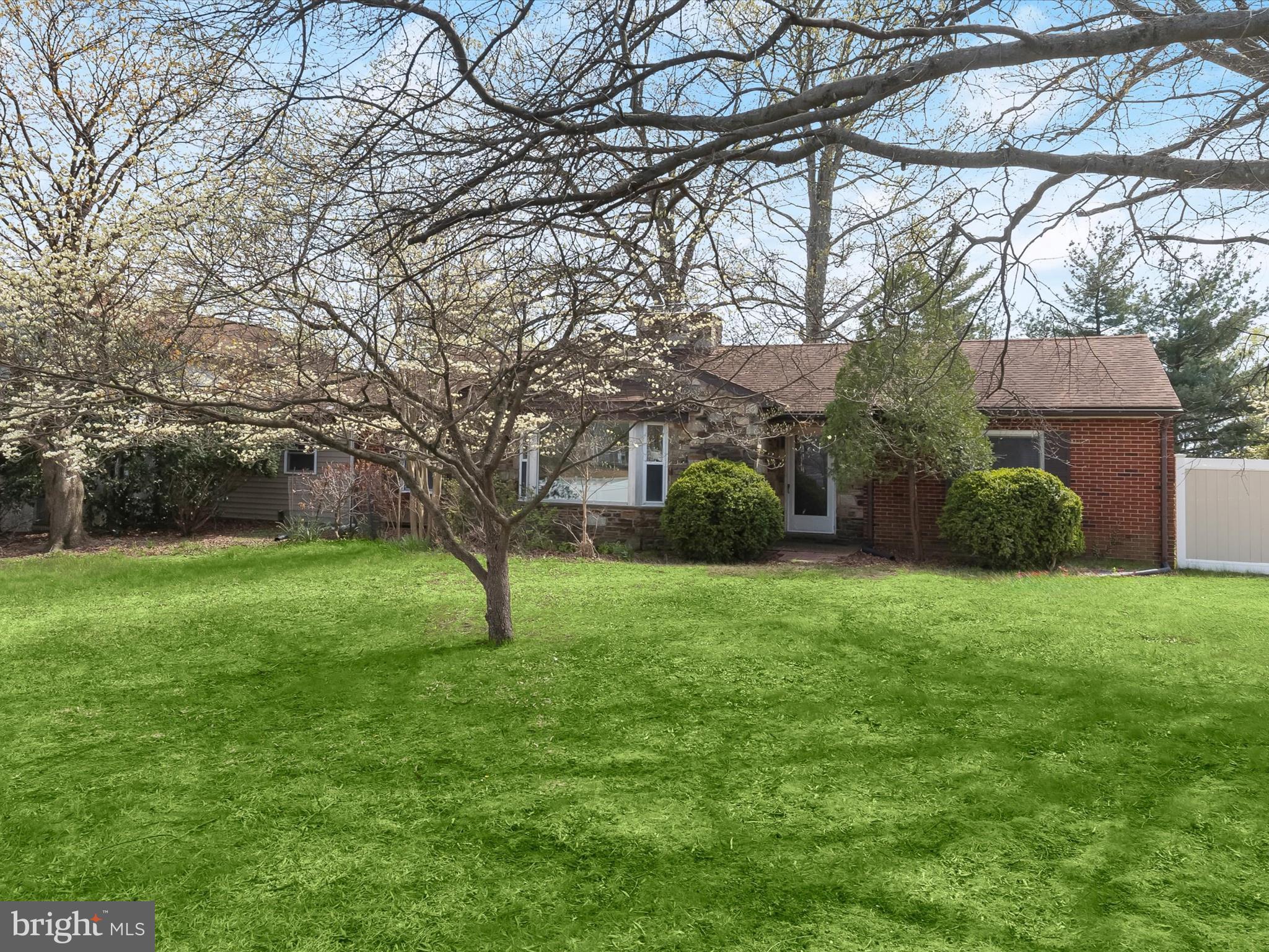 >> IMMEDIATE AVAILABILITY << Set on over half an acre in a quiet, thoughtfully developed neighborhood, this charming rancher offers the perfect blend of space, privacy, and versatility. Stone accents and mature landscaping enhance its curb appeal, while a full privacy fence surrounds the expansive backyard—ready to be transformed into your personal retreat.
Inside, large windows fill each spacious room with natural light, and hardwood floors lie beneath some of the existing carpet. The main level offers two comfortable bedrooms, a full bath with a stackable washer/dryer hookup, and a generous living-dining room combination anchored by a fireplace insert with classic stone surround. The kitchen features table space, a convenient half bath, and access to an enclosed porch perfect for relaxing or entertaining.
Through the kitchen, an addition opens to a second living area, a second laundry room, and stairs leading to two more bedrooms and two full baths—one en suite. A second electrical panel was added to support the addition, enhancing functionality and ease of use. This flexible layout provides plenty of space for multi-generational living, guests, rental opportunities, or work-from-home needs. The lower level is unfinished, offering ample storage or future expansion potential. Part of the home’s spacious addition includes an oversized two-car garage, providing extra functionality and convenience.
Close to local parks and major highways including I-95 and MD-32, the location offers an easy commute to Baltimore, Washington, D.C., and beyond. While the home is being sold as-is this is a rare opportunity to enjoy peaceful living with room to make it your own—and turnkey equity from the start.