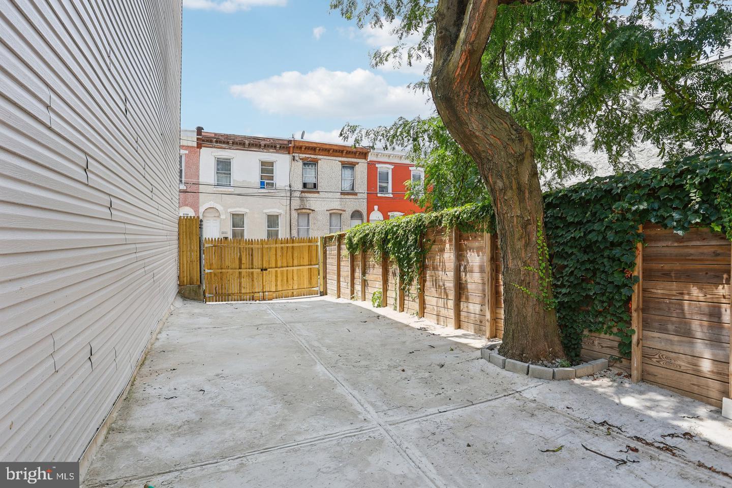 Located in the rapidly developing Norris Square neighborhood, this vacant lot presents an exceptional opportunity for investors, builders, and developers alike. Zoned RSA5, the property offers the potential to build a new construction single-family residence with private parking, outdoor living space, or a modern city retreat in one of Philadelphia’s fastest-growing areas. The existing paved lot with gated access provides added flexibility and convenience for future development possibilities.
Surrounded by ongoing revitalization and new construction projects, Norris Square continues to attract homeowners and investors seeking strong long-term growth potential. Enjoy close proximity to Norris Square Park, Towey Playground, local cafes, restaurants, coffee shops, grocery stores, and neighborhood favorites throughout Kensington and Fishtown. Convenient access to public transportation, Center City, Northern Liberties, and major commuter routes further enhances the appeal of this prime development opportunity. Please note the adjoining residence, 2225 N Waterloo Street, is also being offered for sale and may be purchased together with the lot as a package or separately.