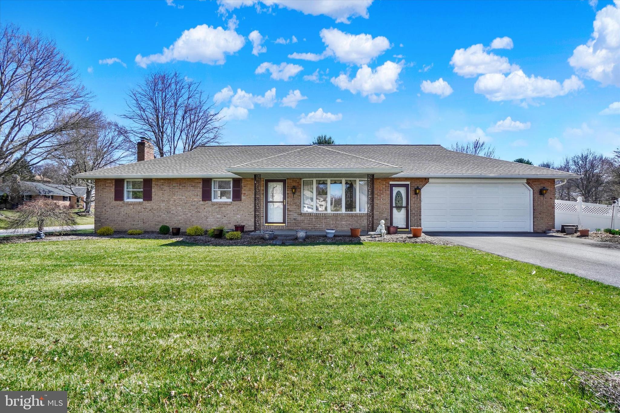 Nestled in a sought-after neighborhood, within top-rated Dallastown School District, and located minutes to I83 Loganville and Leader Heights Exits, this one-owner 3BR, 2BA brick rancher has been lovingly maintained over the years. With solid construction and great bones, the property offers a fantastic opportunity for buyers looking to personalize a home to their taste. The spacious layout provides a comfortable living environment with a living room, eat-in kitchen, hall bath with access to the primary bedroom, and laundry on the main floor. The daylight lower level features a family room with a brick fireplace, full bath, unfinished storage room, large workshop (wood working saws and equipment conveys), and unfinished utility room. A 2nd set of stairs leads directly to the finished 2-car garage. Countless hours are sure to be spent on the covered front porch or covered rear patio overlooking a beautiful partially fenced, corner lot perfect for outdoor enjoyment, whether it’s gardening, entertaining, or simply relaxing.   The home’s prime location ensures quick access to I83 making it ideal for commuters. You are also a stone throw to Nixon Park where you can trail hike, visit the Nature Center, or attend a Themed Program. In addition, Lake Redman, William Kain Park, and York County Heritage Rail Trail are nearby......and don't forget about Brown's Orchard & Farm Markets in Loganville!  While the home is in need of some cosmetic updates, it presents a wonderful chance to build instant equity. The well-kept home serves as a strong foundation for modernization, whether it’s updating the kitchen and baths, replacing the carpets, or adding fresh paint. Finished 2-car garage with stairs to lower level, two service doors, and pull-down attic storage.  NEW 50yr architectural shingle roof in 2020; NEW 4-zoned, oil boiler in 2012; and NEW central air conditioning in 2010. It’s a rare opportunity to own a home that can be transformed into a true gem, while maintaining its value for years to come. Don’t miss out on the potential this home has to offer!  AGENTS - Please read Agent Remarks!